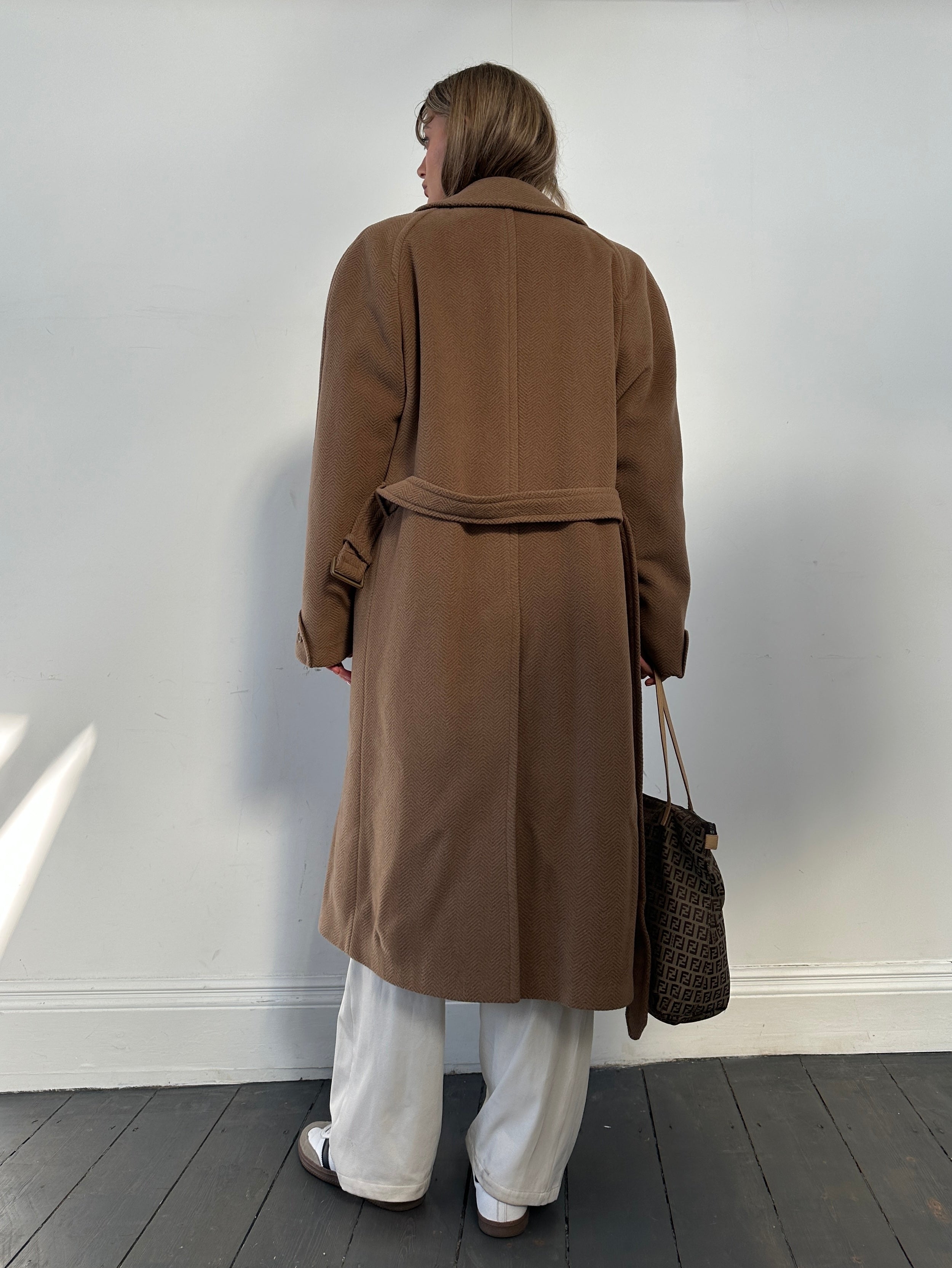 Christian Dior belted double-breasted wool coat in size L, featuring classic design and tailored fit, displayed on a mannequin.