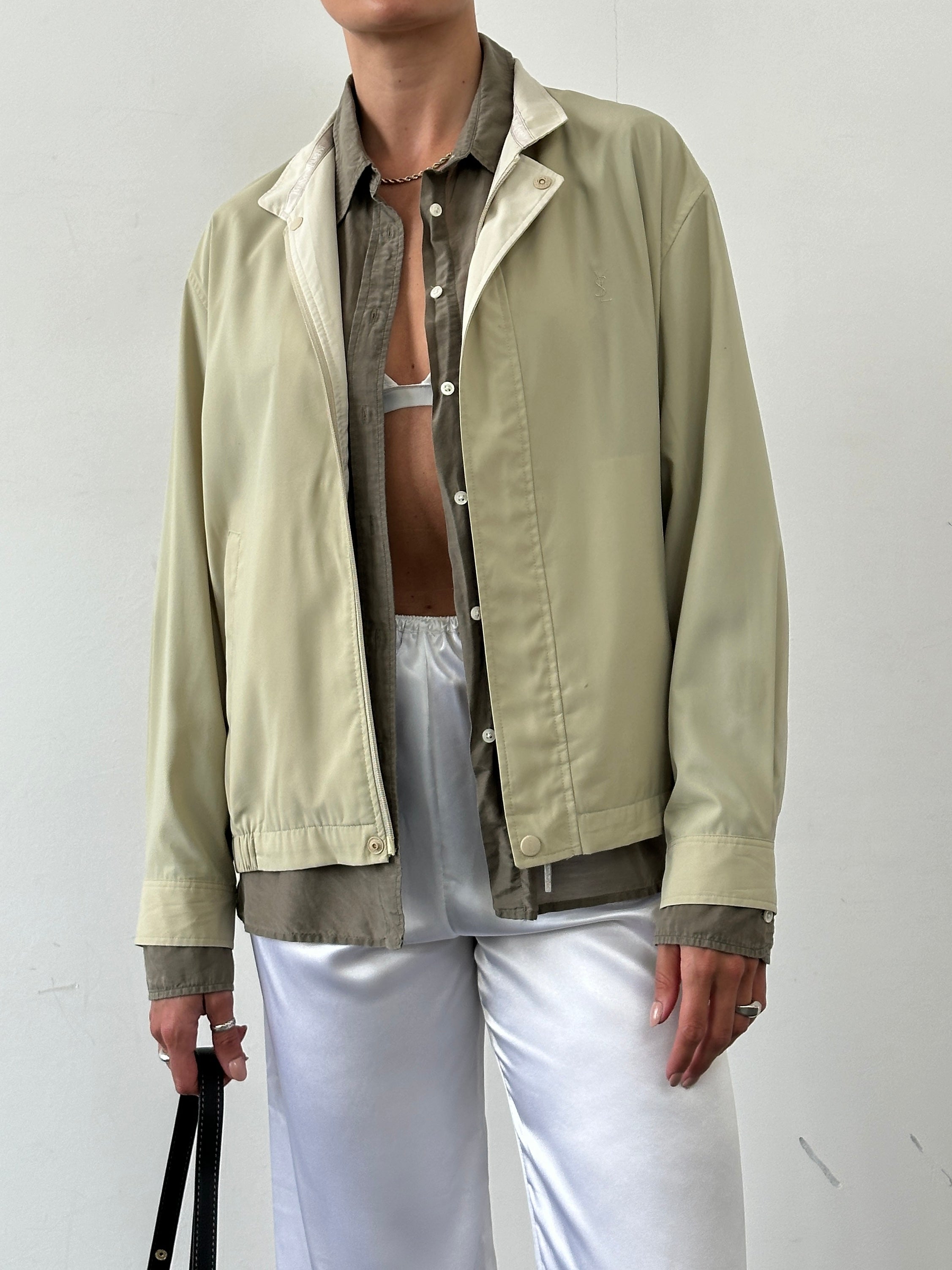 Yves Saint Laurent Pour Homme logo bomber jacket in black, front view showing logo details and stylish design.