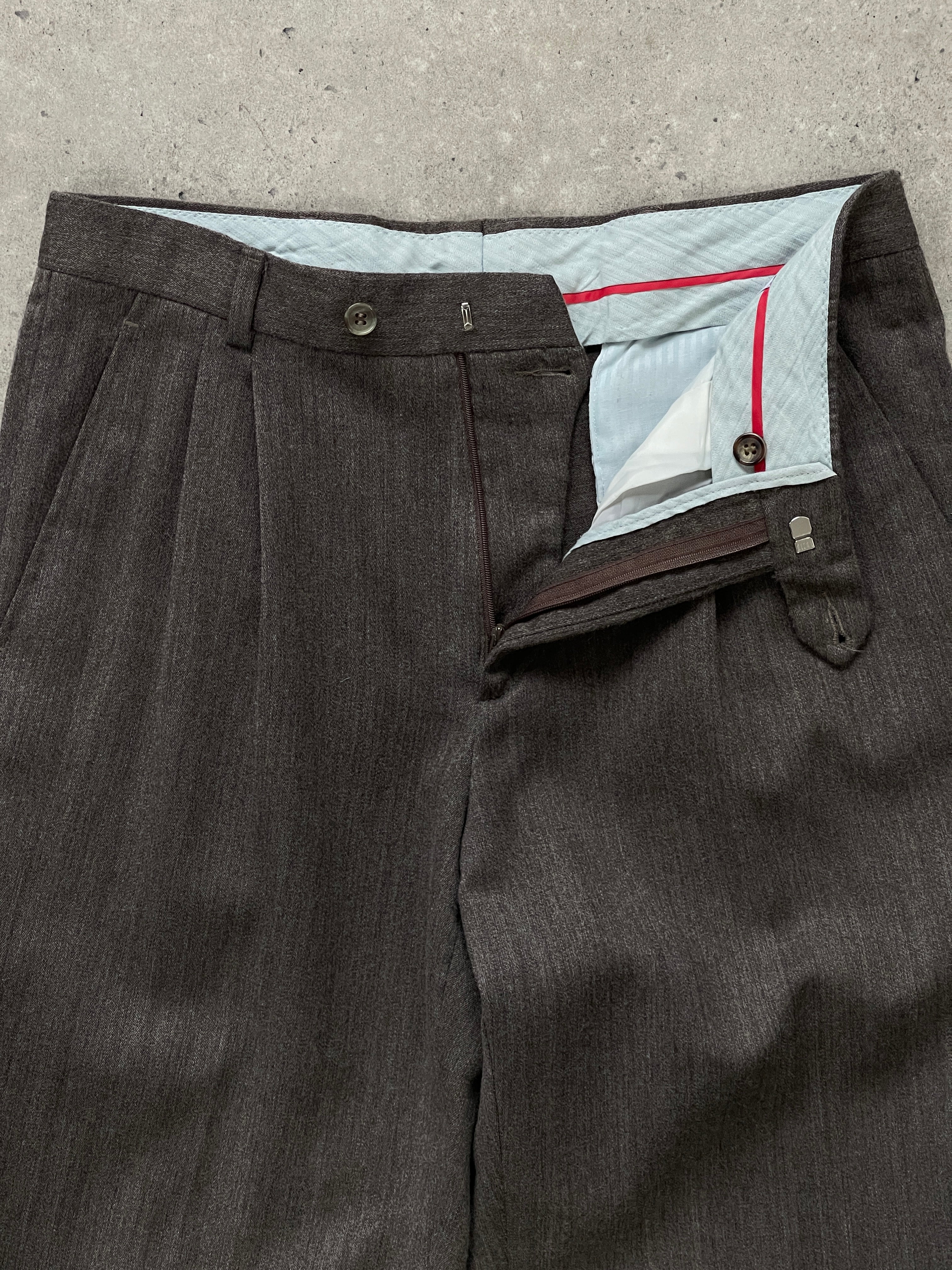 Vintage 1990s pure wool tailored trousers in size W30, gray color, with classic fit and structured design.