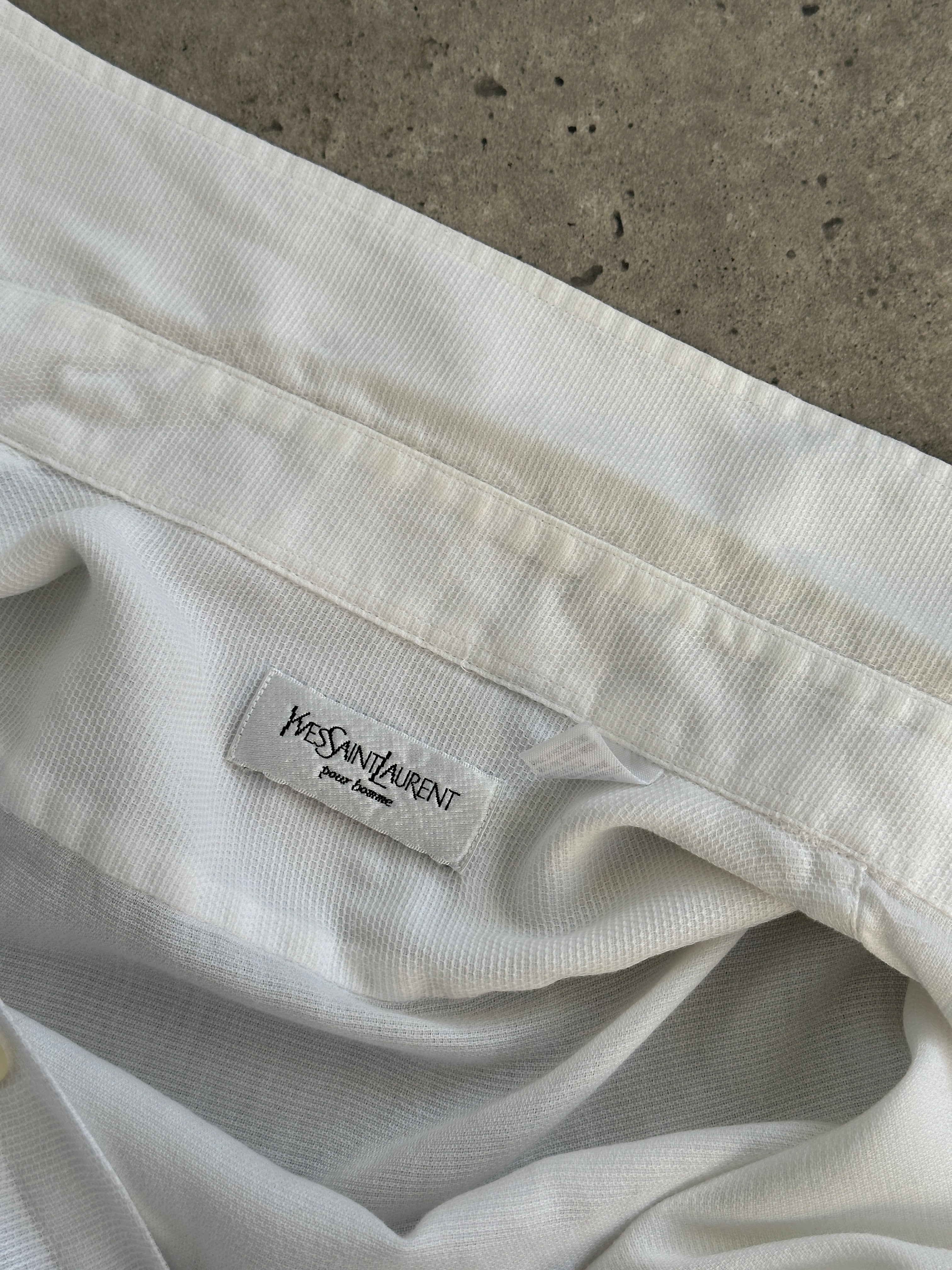 Yves Saint Laurent Pour Homme cotton logo shirt in size M/L, featuring the iconic YSL branding on a stylish men's shirt.