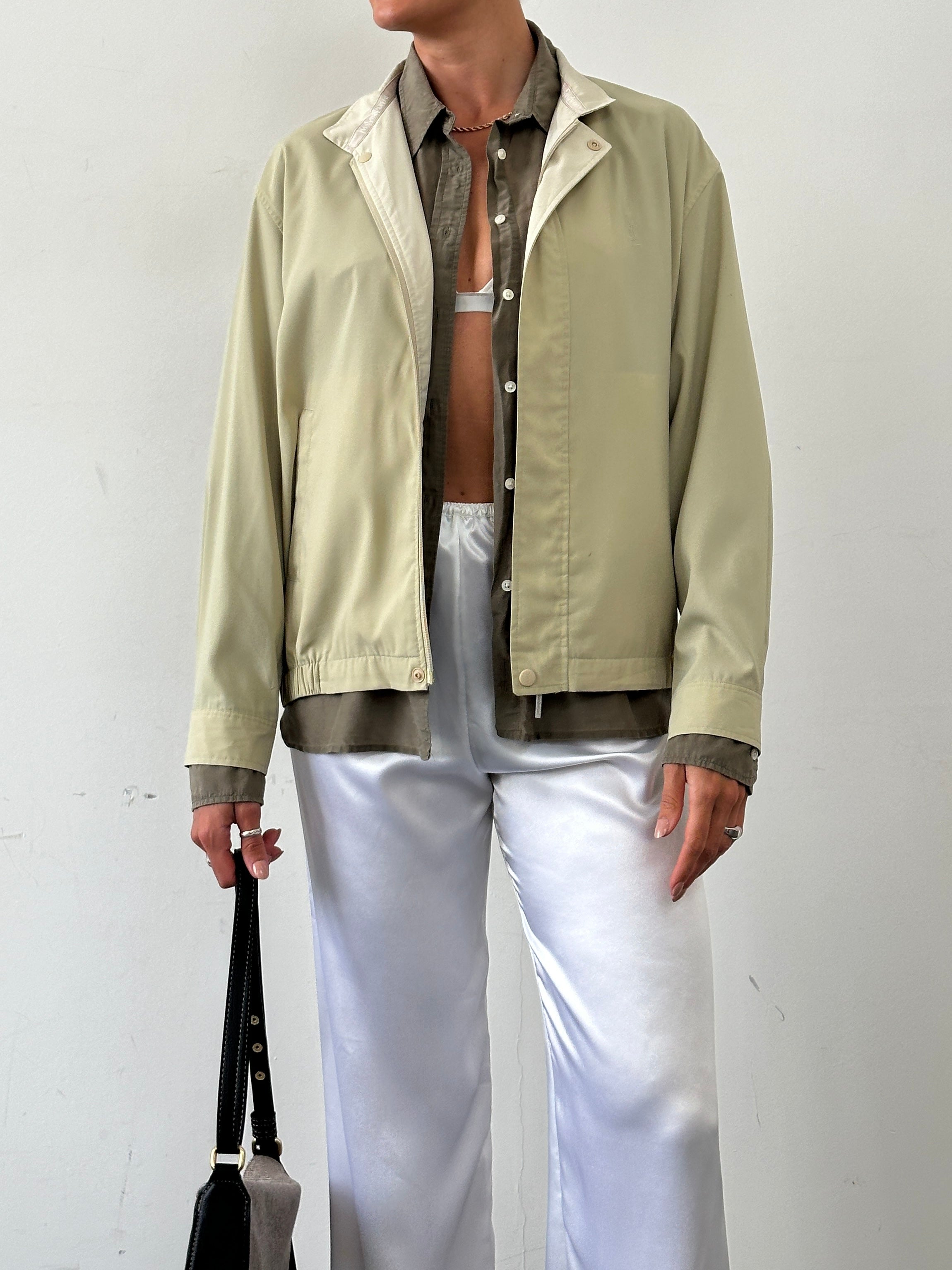 Yves Saint Laurent Pour Homme logo bomber jacket in size M/L, showcasing the stylish design and brand logo on the front.