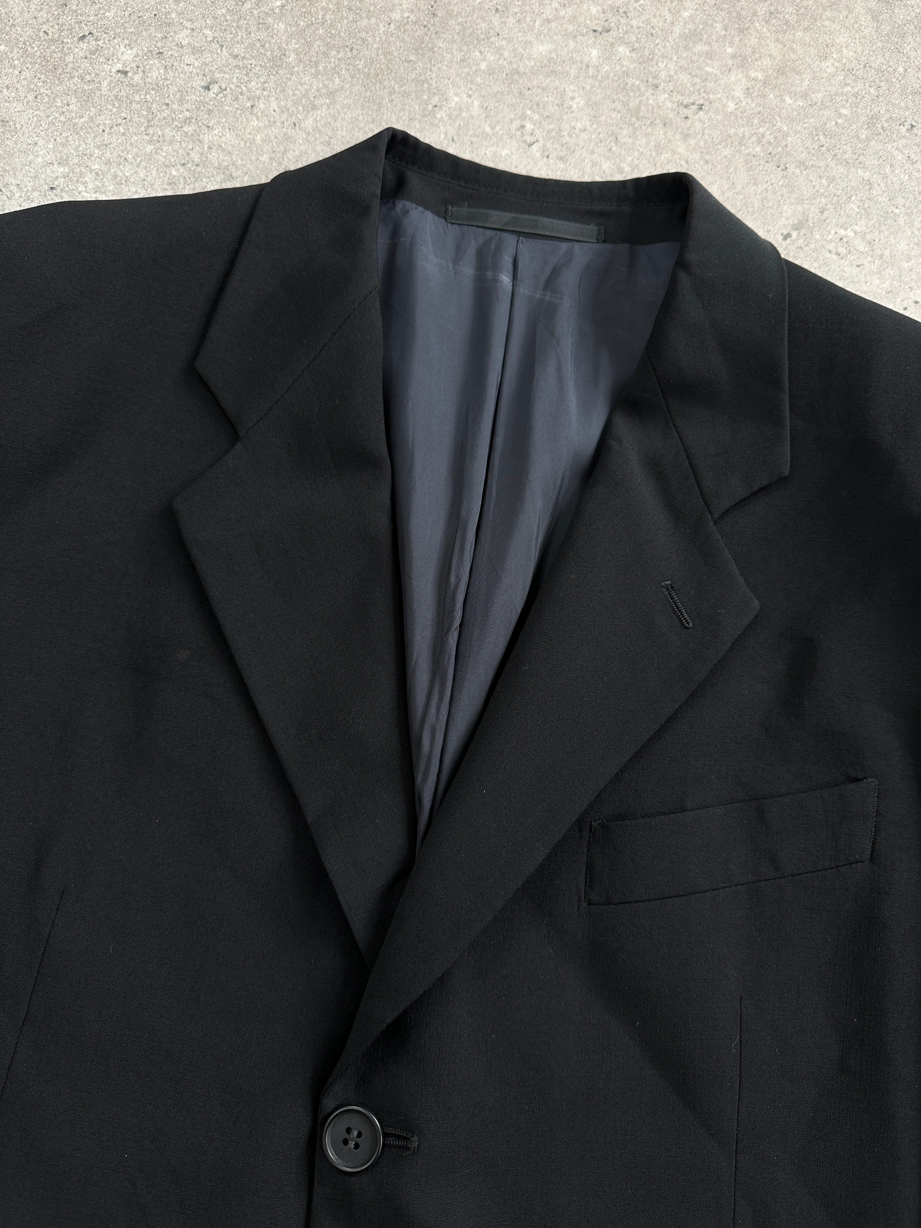 Giorgio Armani Le Collezioni 1990s wool single-breasted blazer in size 40R/M, featuring classic tailored design and neutral color.
