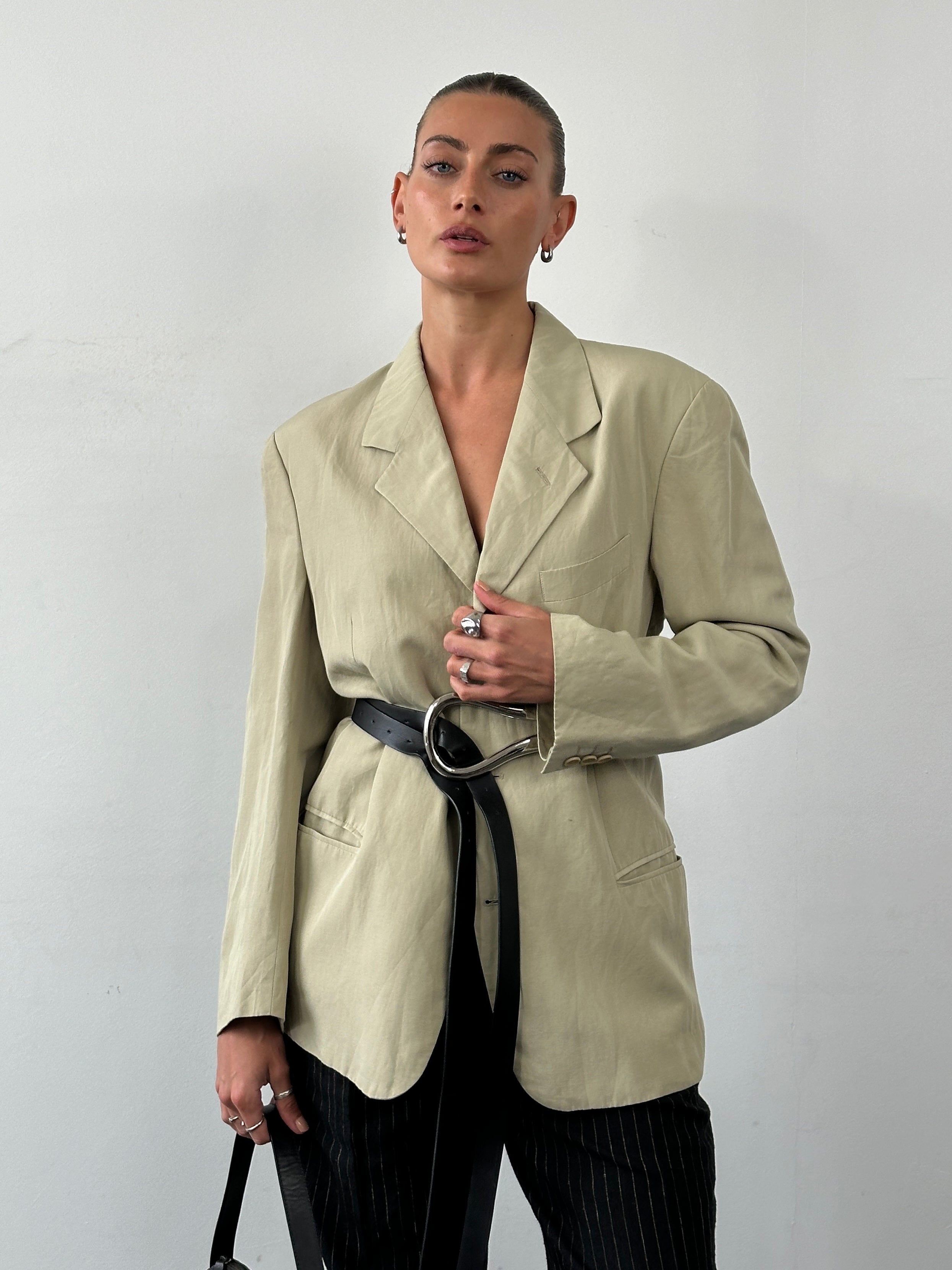 Emporio Armani linen single-breasted blazer in size 40R/L, tailored fit, light beige color, displayed on a hanger.