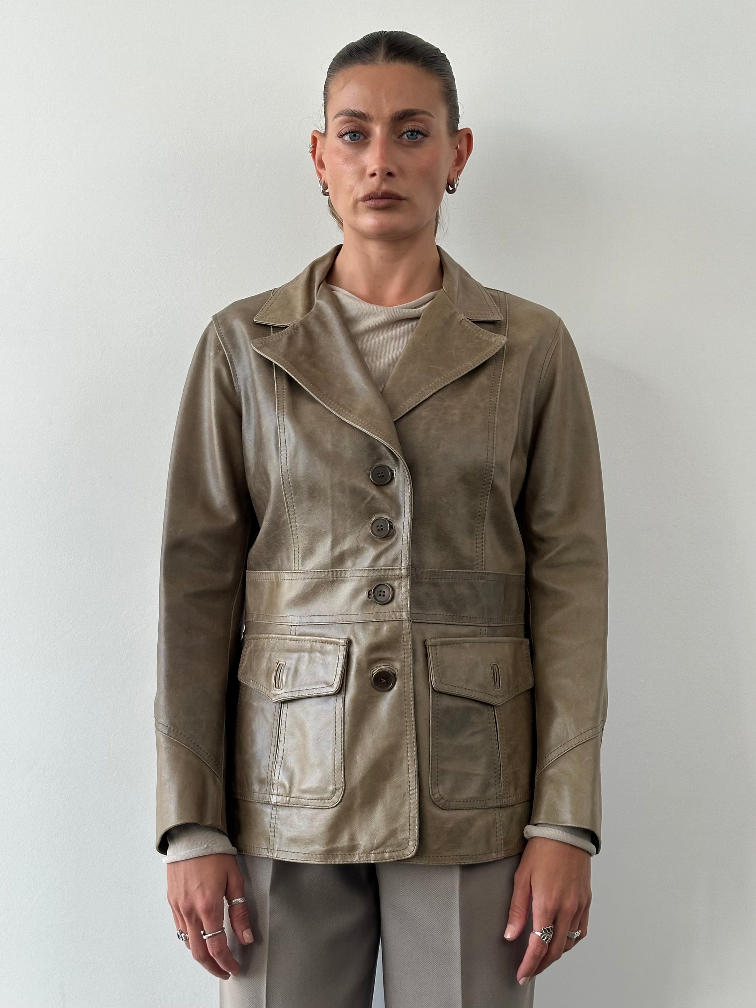 Vintage Italian vintage aged leather blazer jacket in size S/M, featuring classic design and rich leather texture.