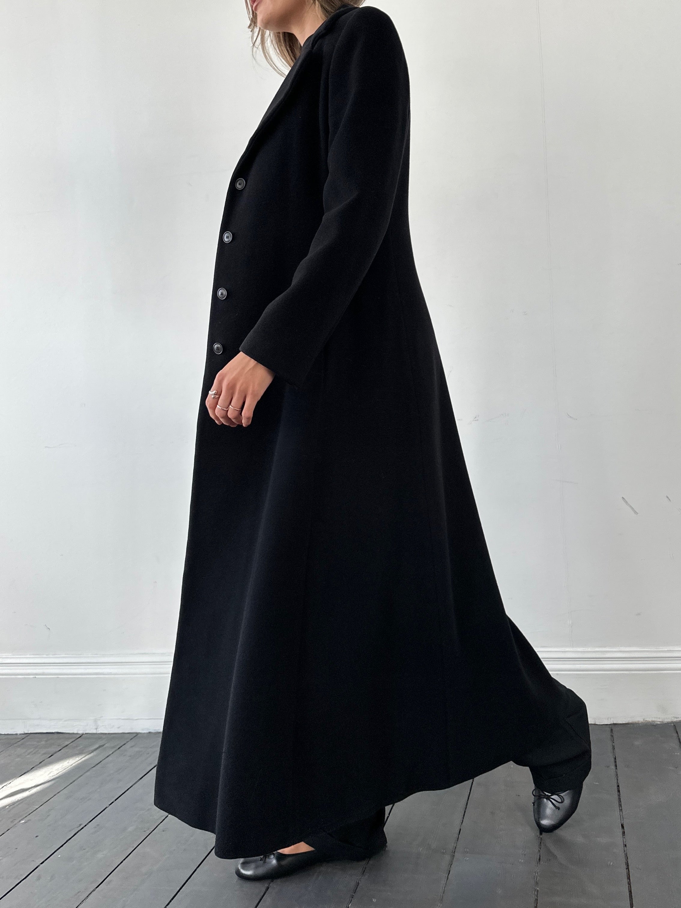 Emporio Armani A-Line floor-length cashmere coat in S/M displayed on a hanger, showcasing its elegant design and soft fabric.