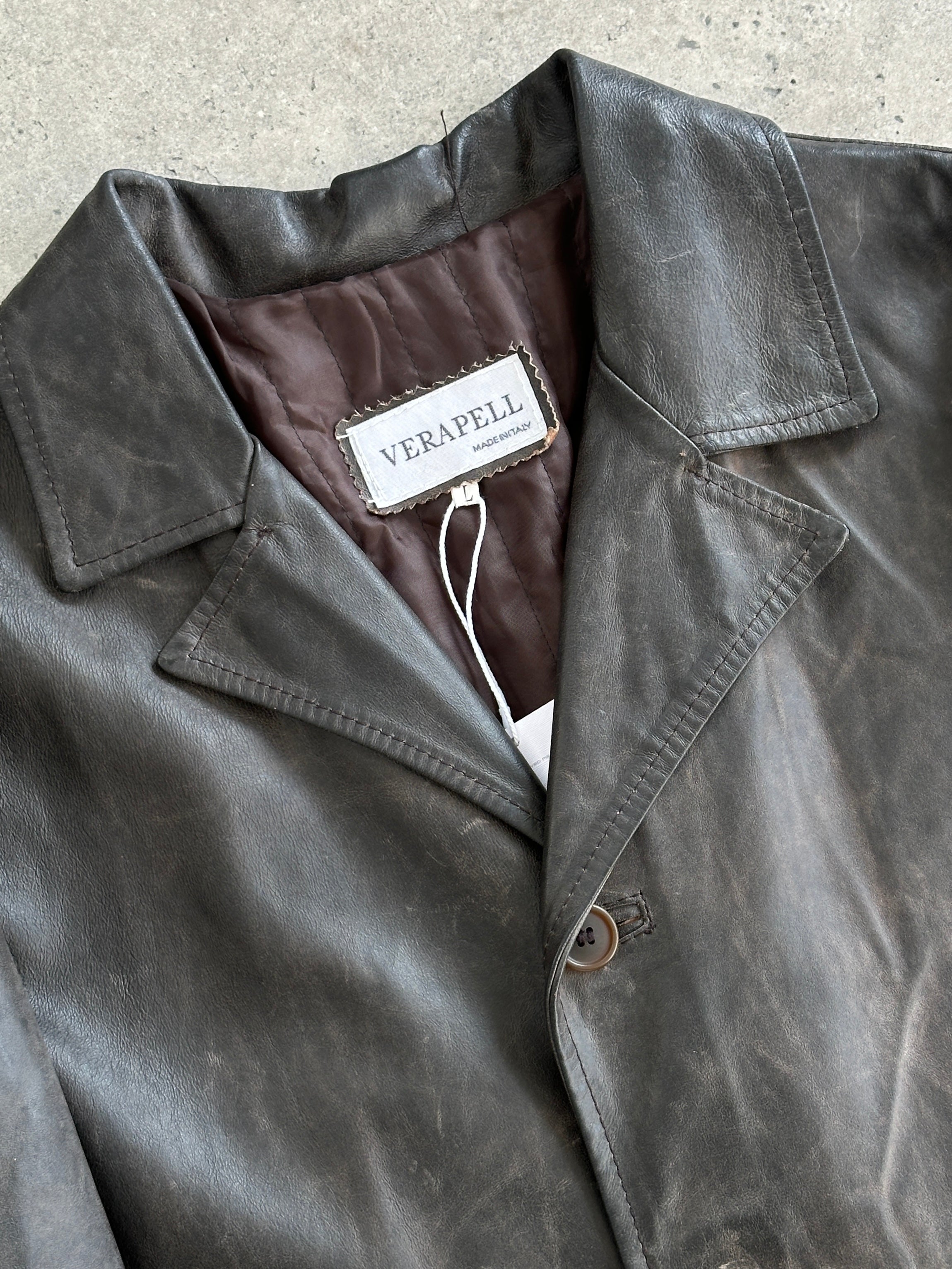 Vintage Italian distressed leather jacket, size large, with a rugged, vintage-inspired design and detailed leather texture.