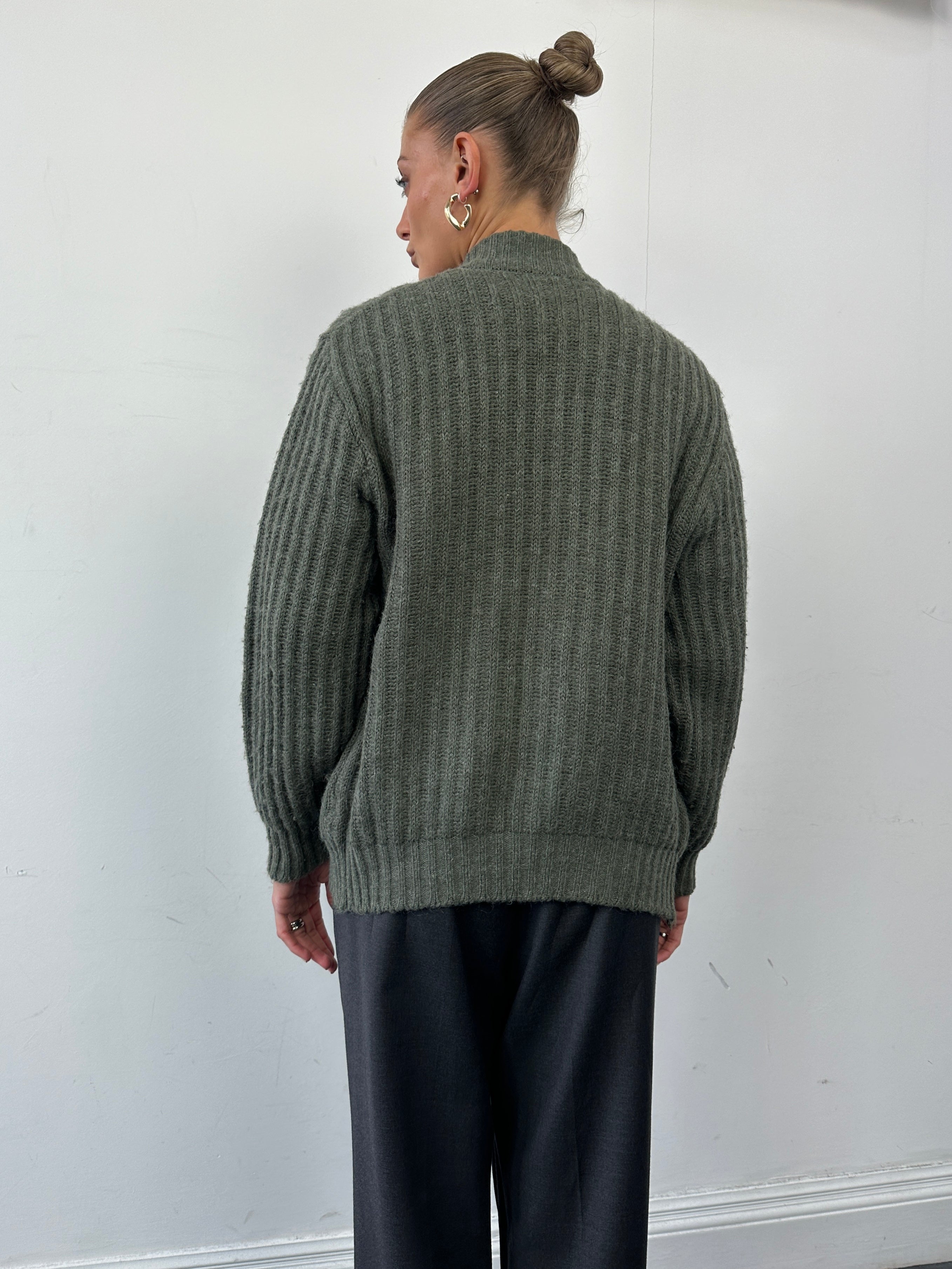 St Michael wool knitted cardigan in size M, featuring a cozy, textured knit design, long sleeves, and button closure.