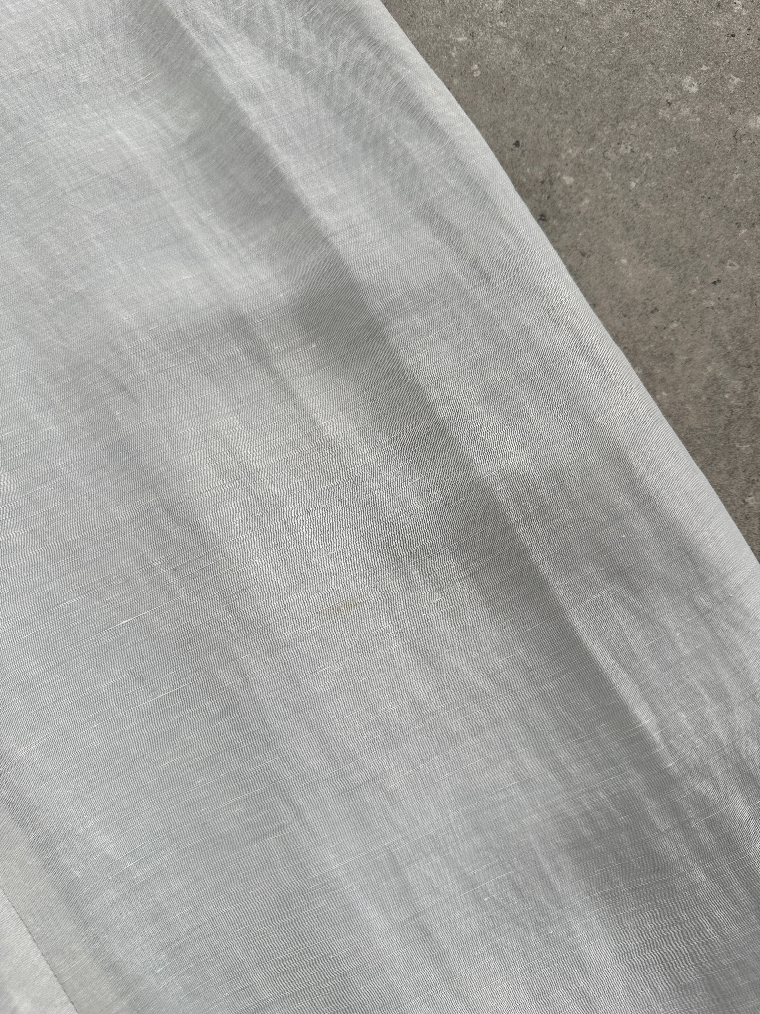Giorgio Armani 1999 wide-leg linen trousers in size W28-30, featuring a relaxed fit and lightweight fabric.