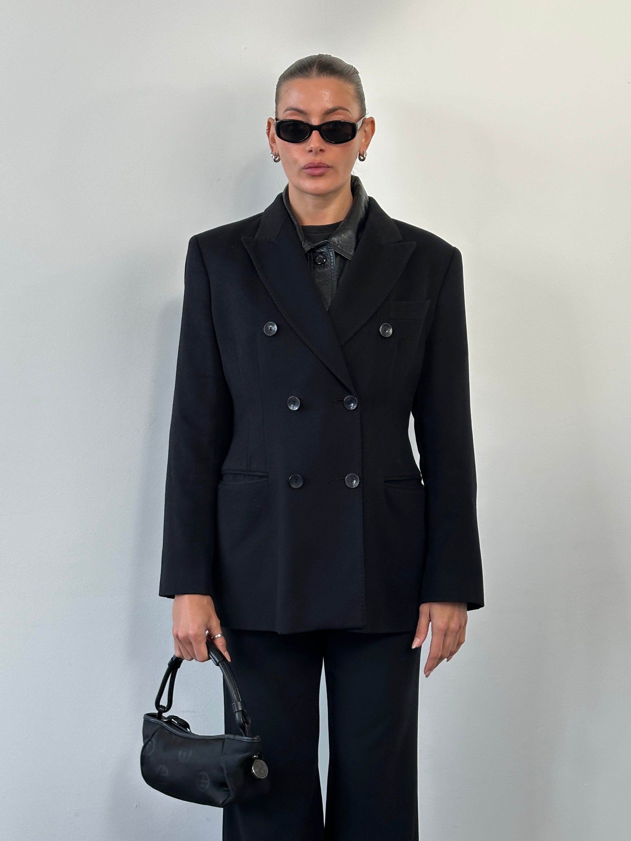 Gianfranco Ferre 1990s wool and cashmere double-breasted blazer in size M, tailored with a classic lapel and button closure.