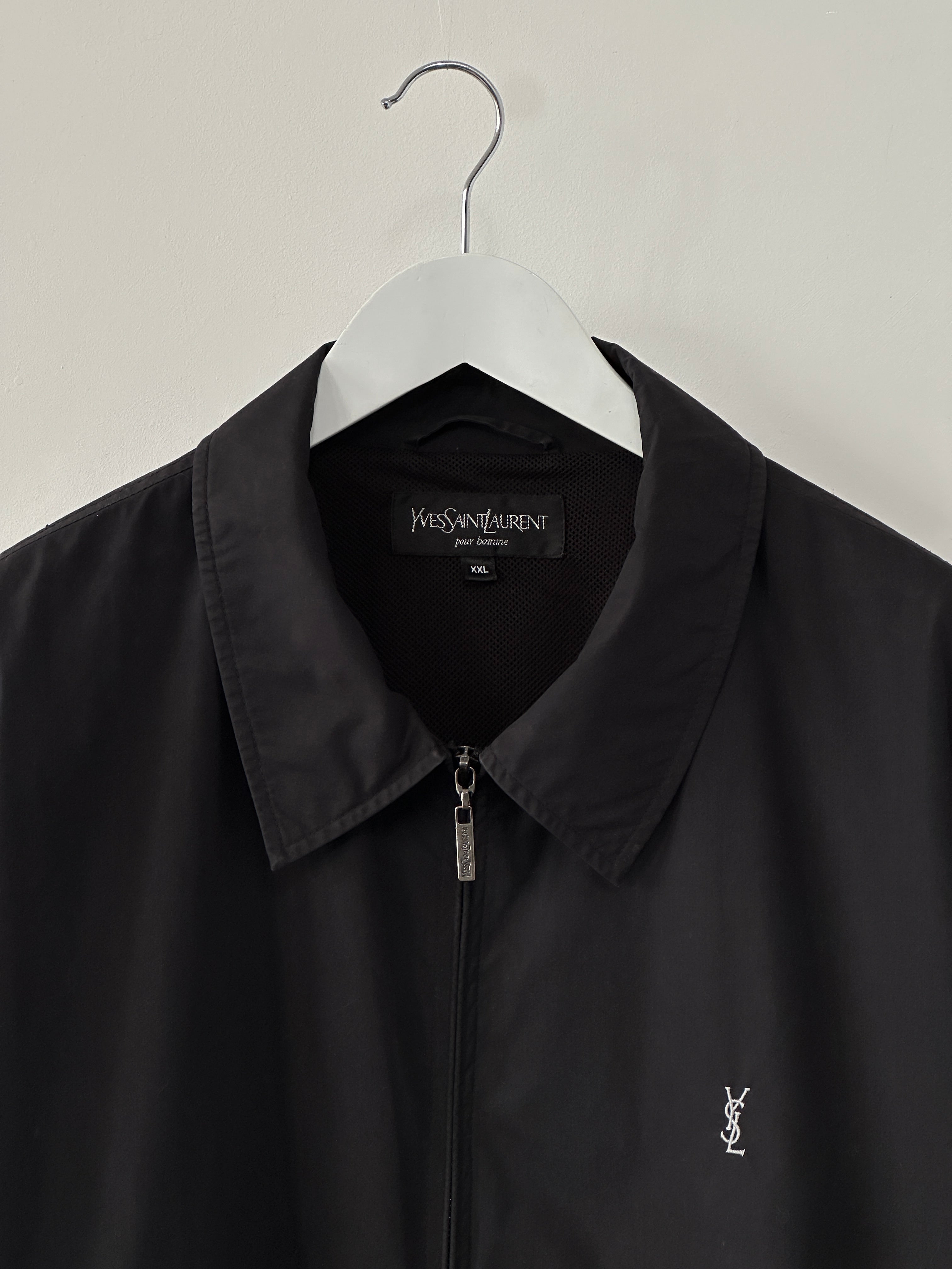 Yves Saint Laurent Pour Homme logo bomber jacket in XXL with black fabric and signature branding on front and sleeves.