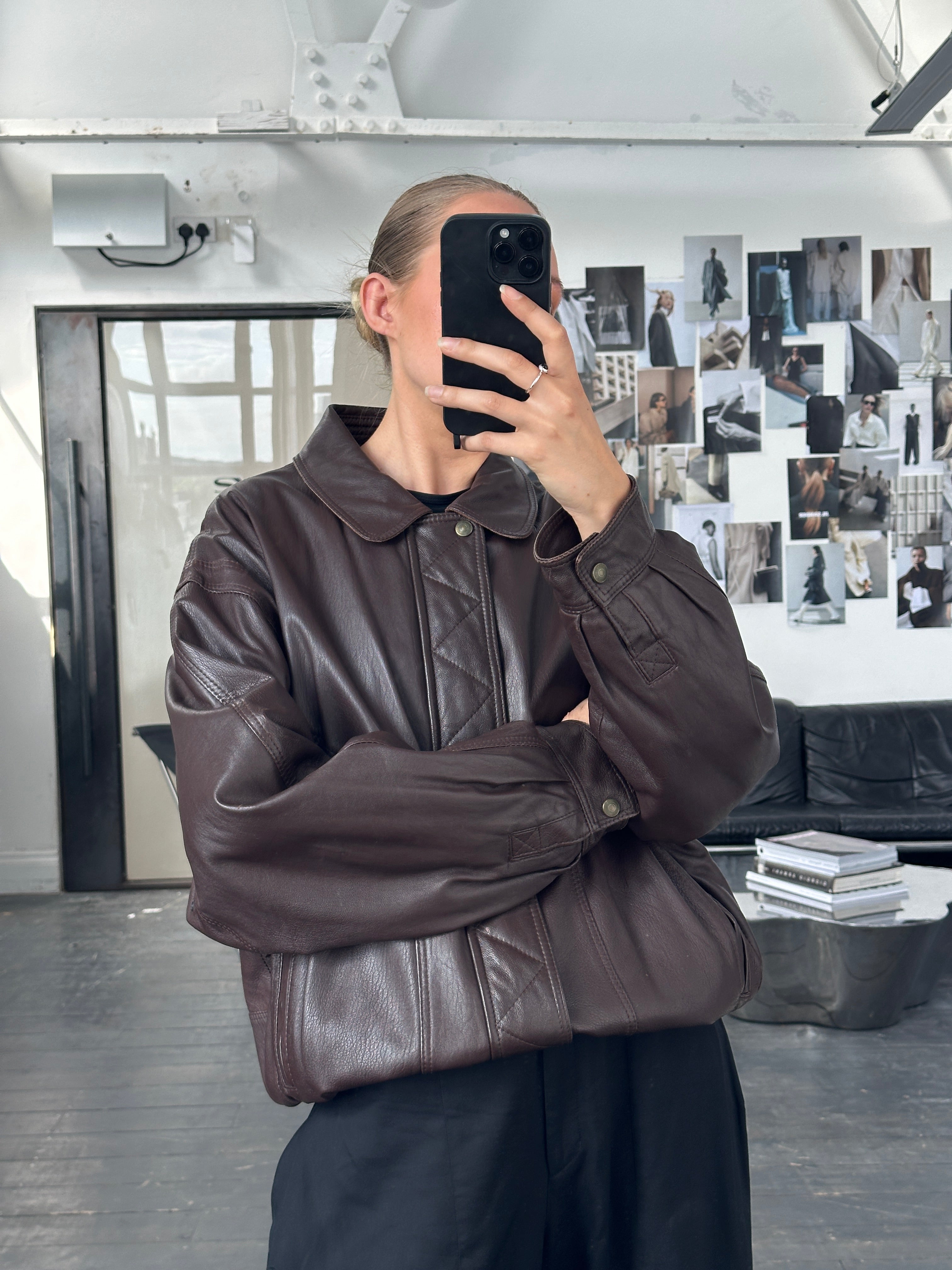 Jaeger 1980s leather bomber jacket in XL, showcasing a classic black leather design with ribbed cuffs and collar.