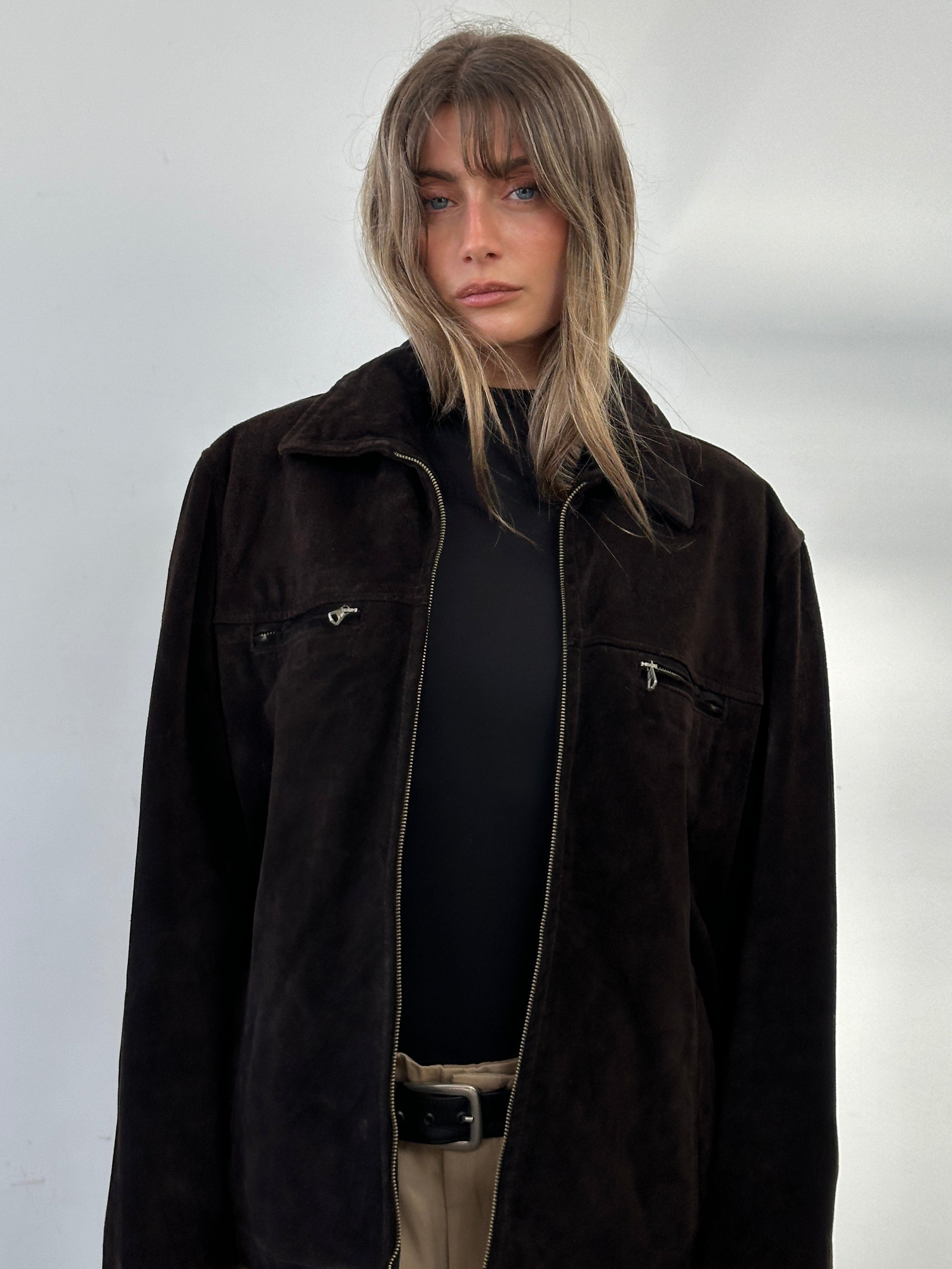 Vintage boxy suede jacket in tan with a classic collar and long sleeves, displayed on a neutral background.
