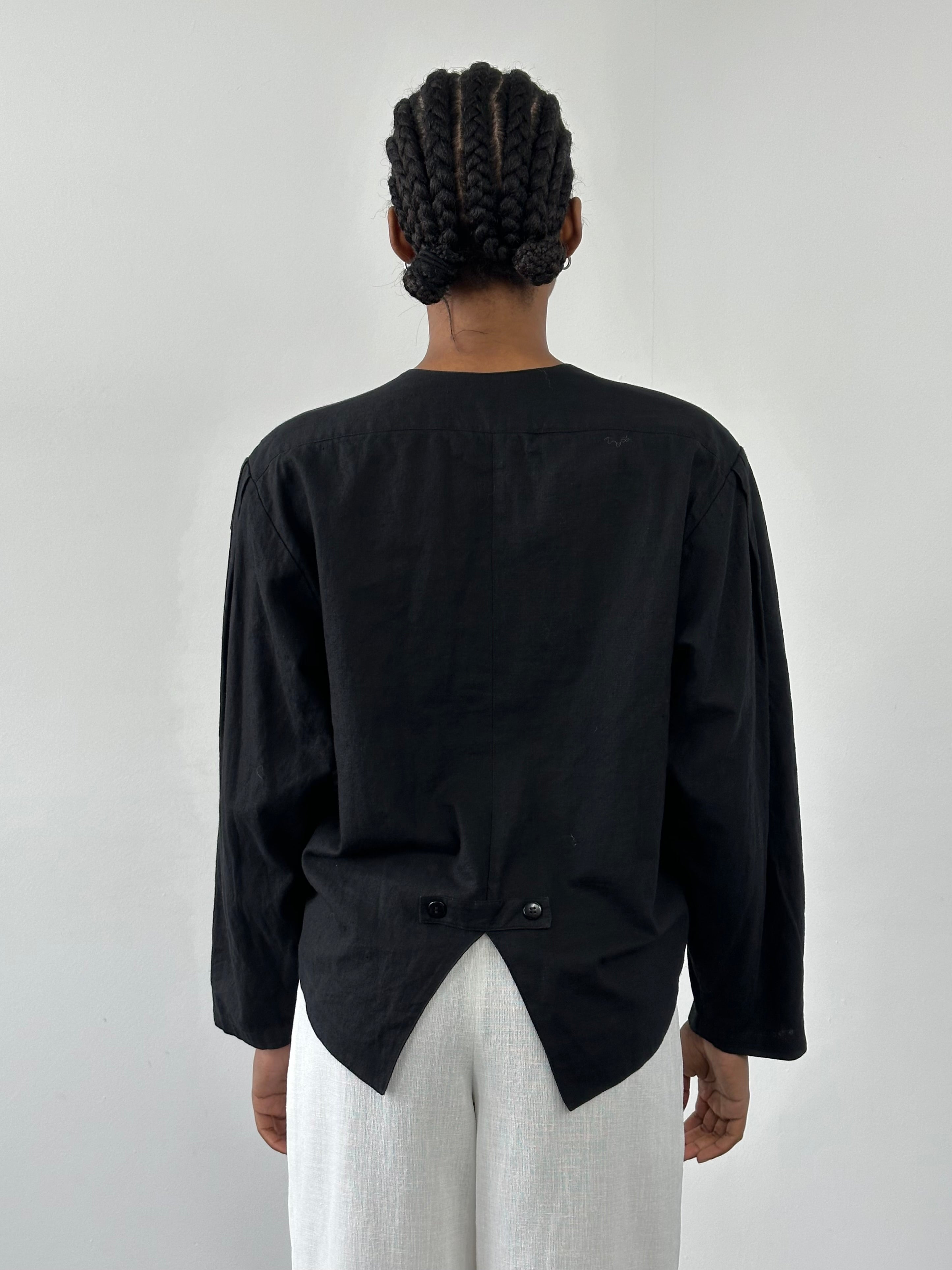 Vintage 1990s linen cotton boxy crop jacket, medium size, with a relaxed fit and classic design, displayed on a hanger.