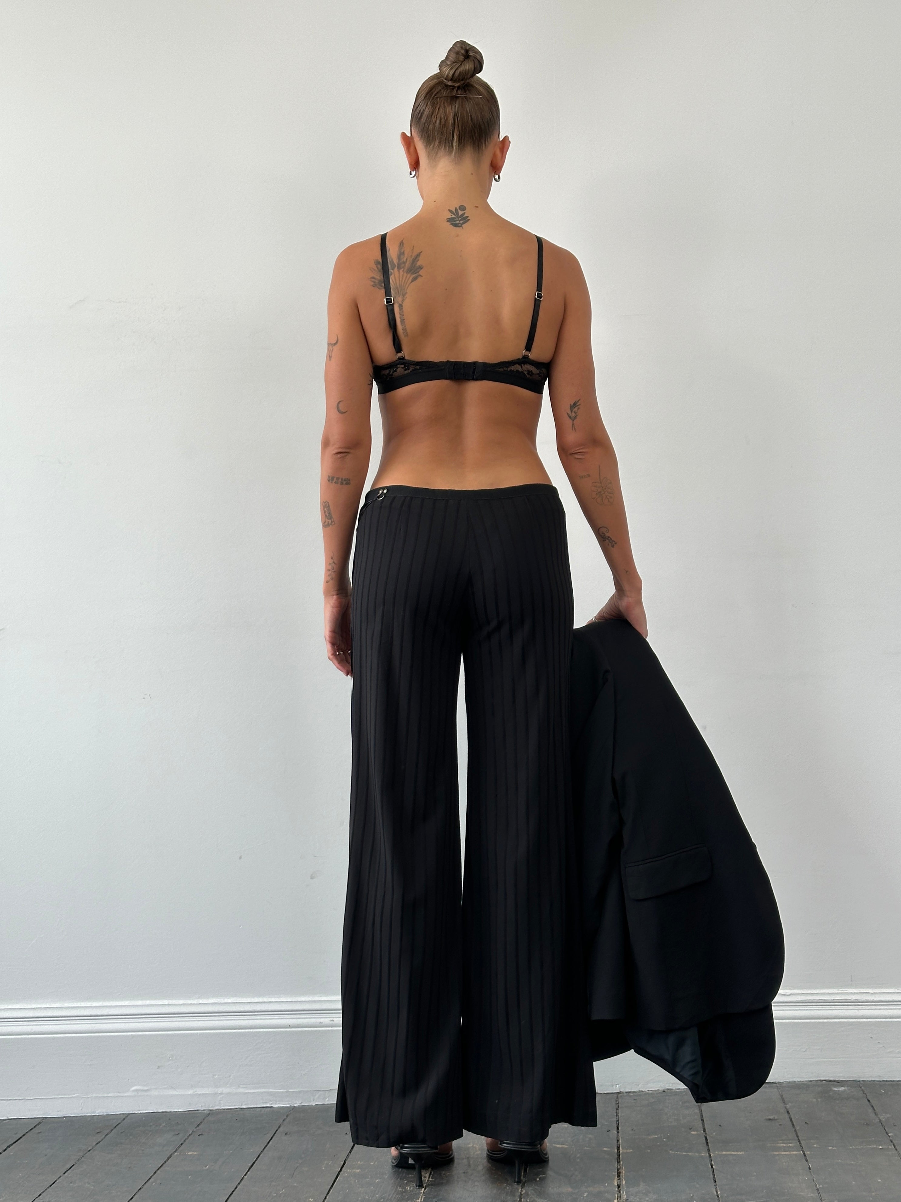 Richmond tie waist stripe wide-leg trousers in black and white, front view showing high-waisted design and relaxed fit.
