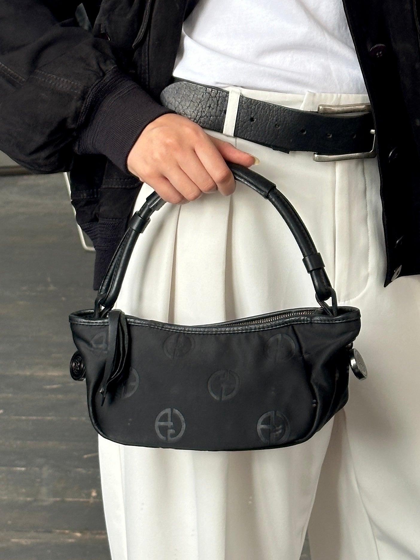 Giorgio Armani 2000s GA Monogram Baguette Bag with signature pattern and leather strap, stylish and compact accessory.