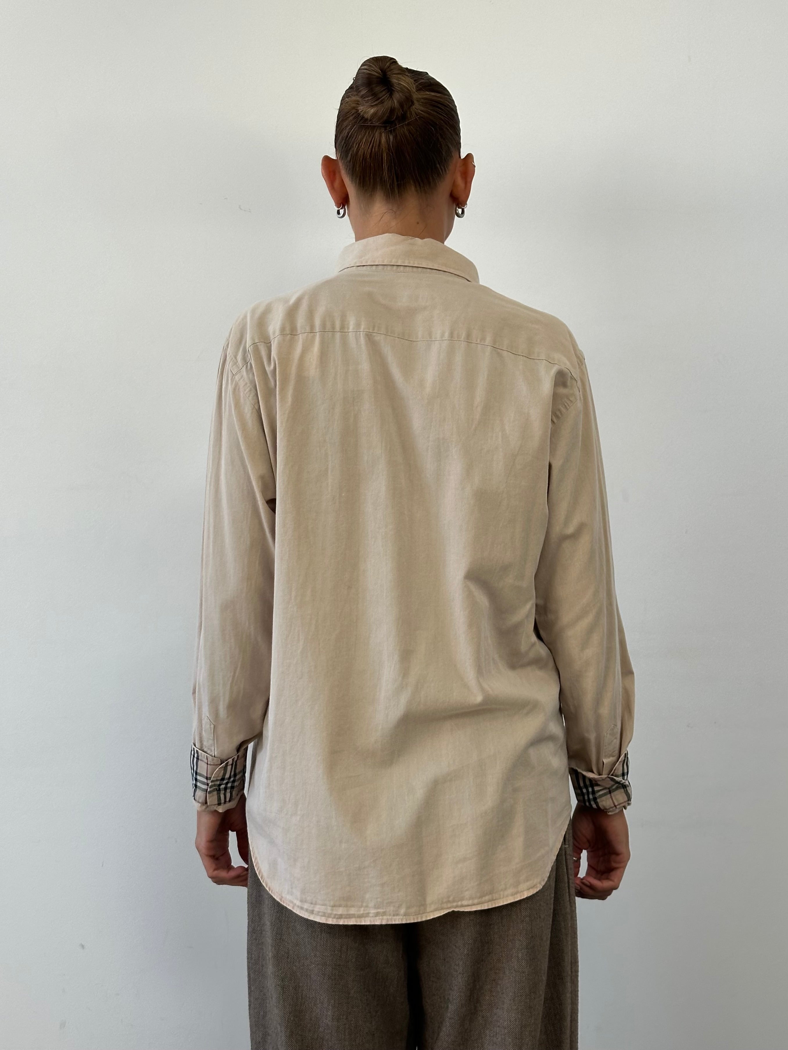 Burberry London pure cotton logo shirt in M/L size, featuring a classic design with the iconic Burberry logo on the front.
