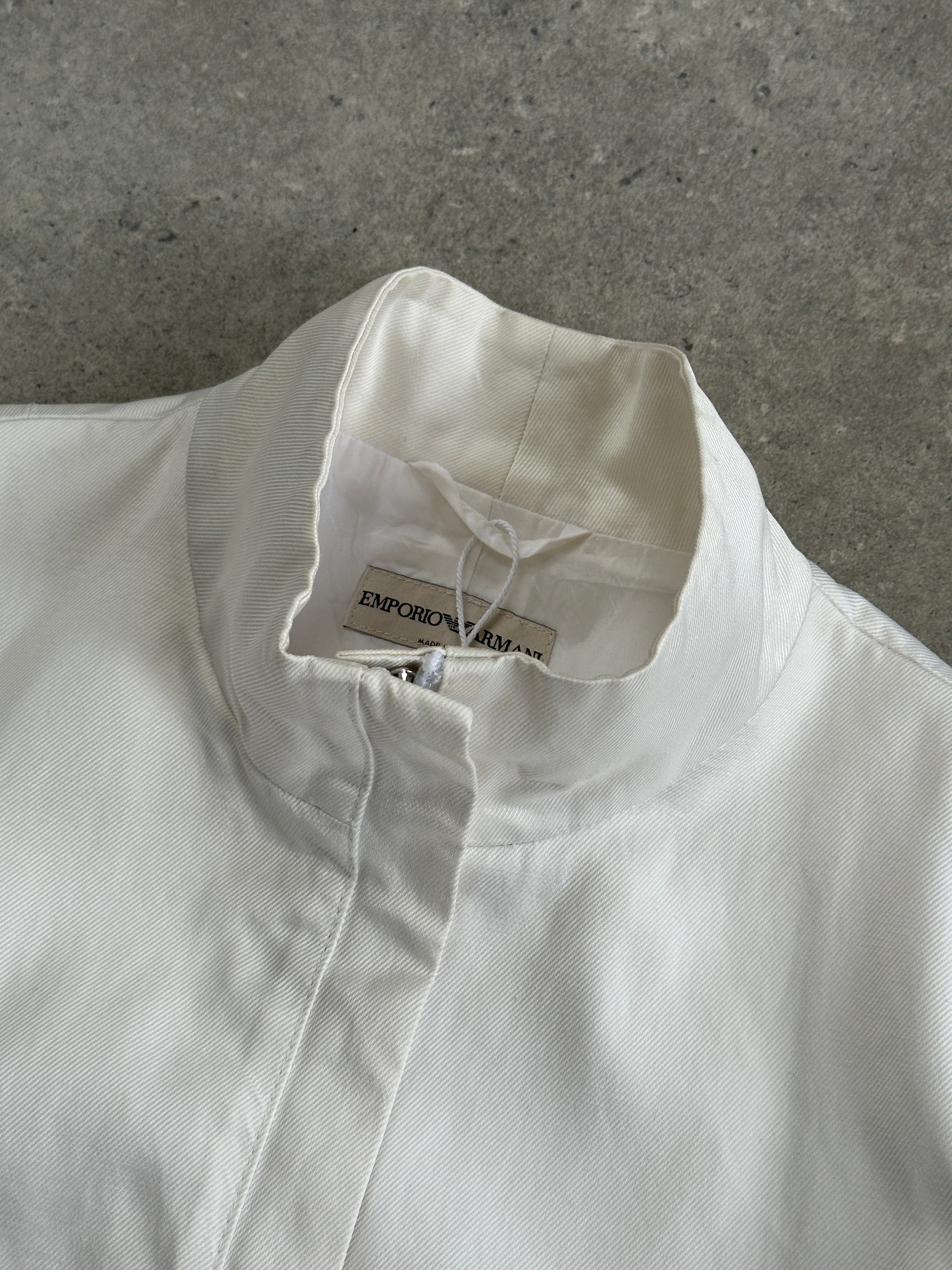 Emporio Armani 2000s cotton jacket and two-piece set, with a casual fit and classic design, displayed in this fashion image.