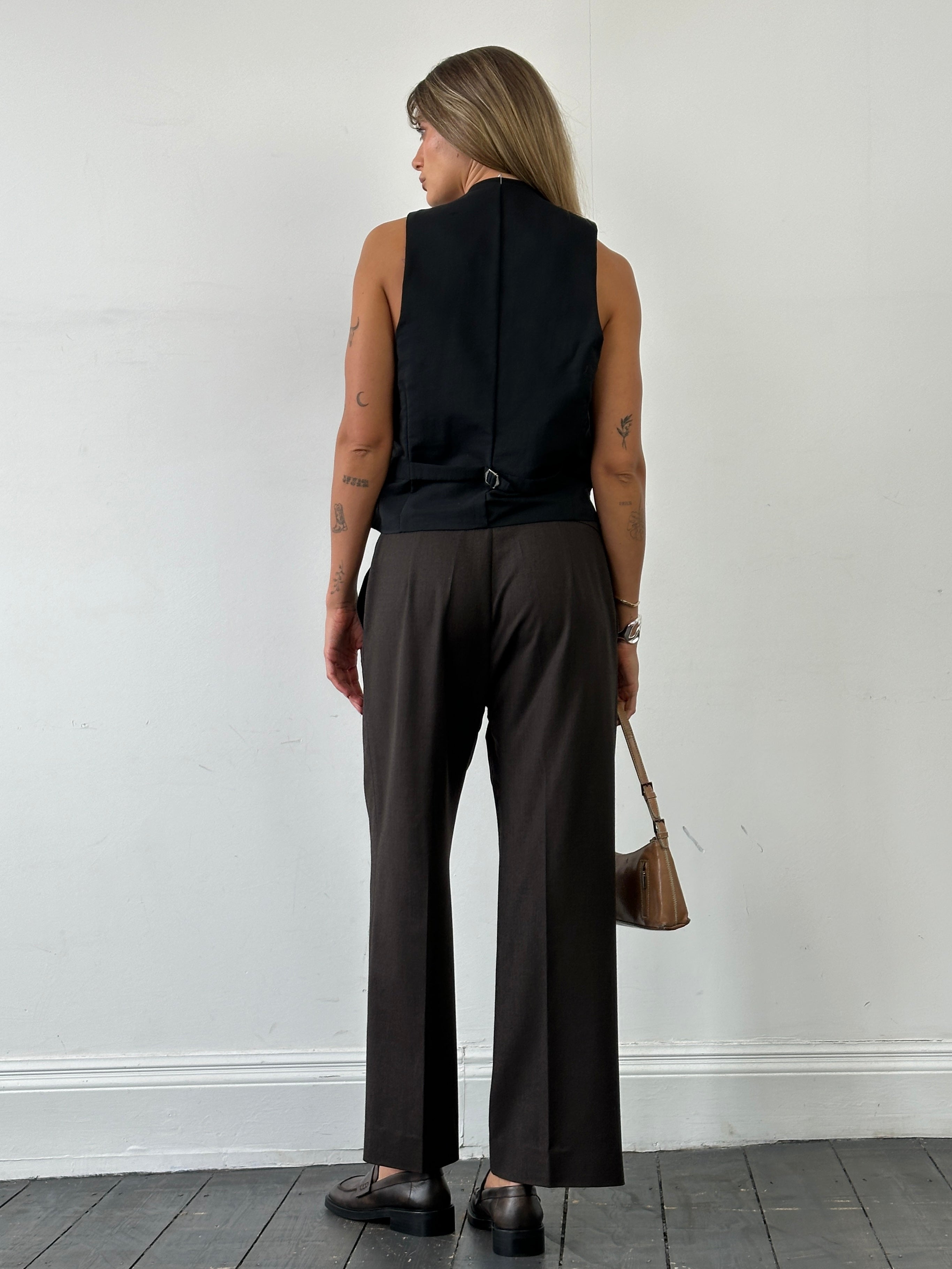 Max Mara virgin wool straight-leg mid-waist trousers in W32, shown on a model, with tailored fit and classic design.