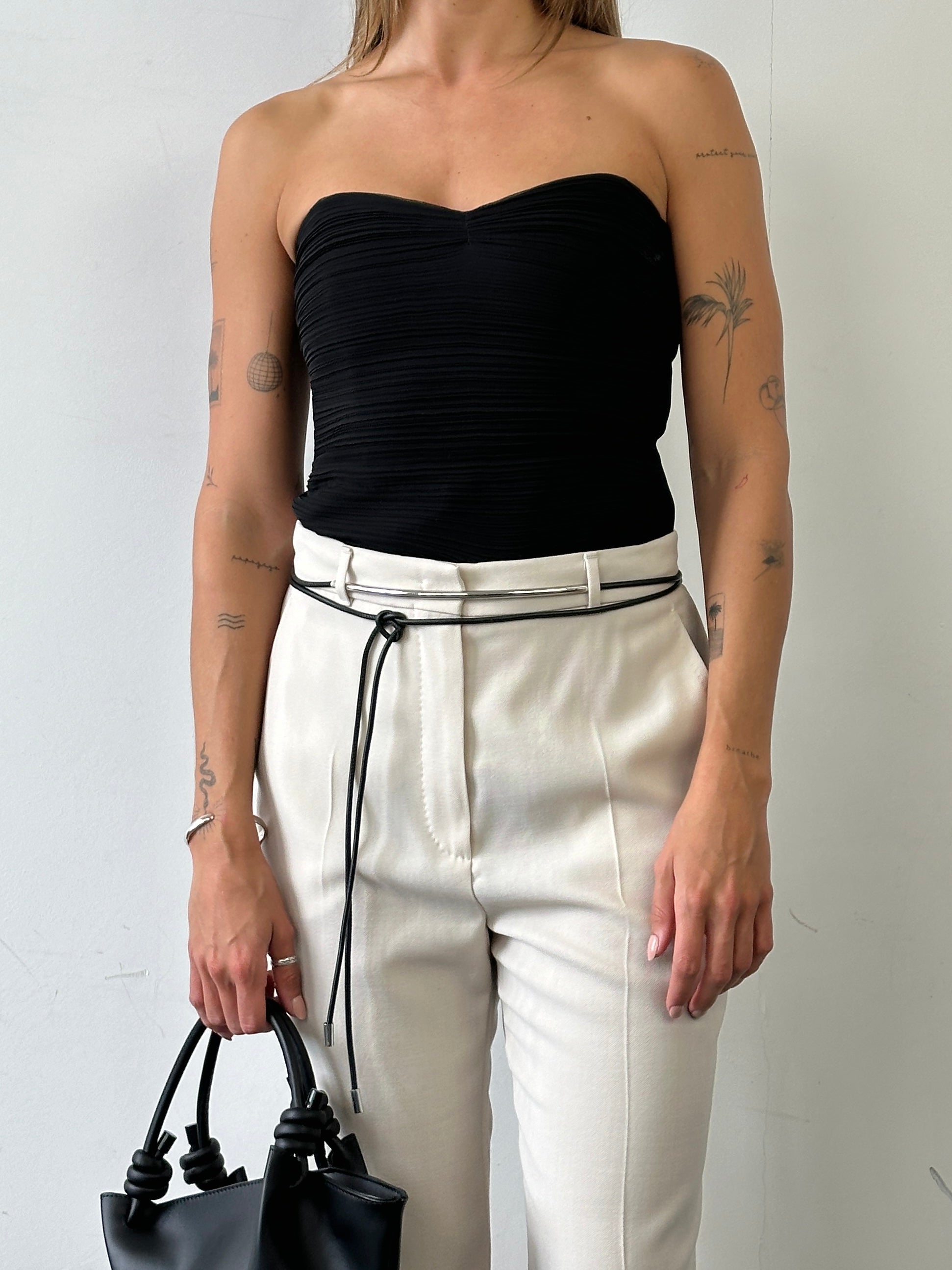 Armani Collezioni 1990s plisse strapless corset top in black, with fitted design and subtle texture, size small.