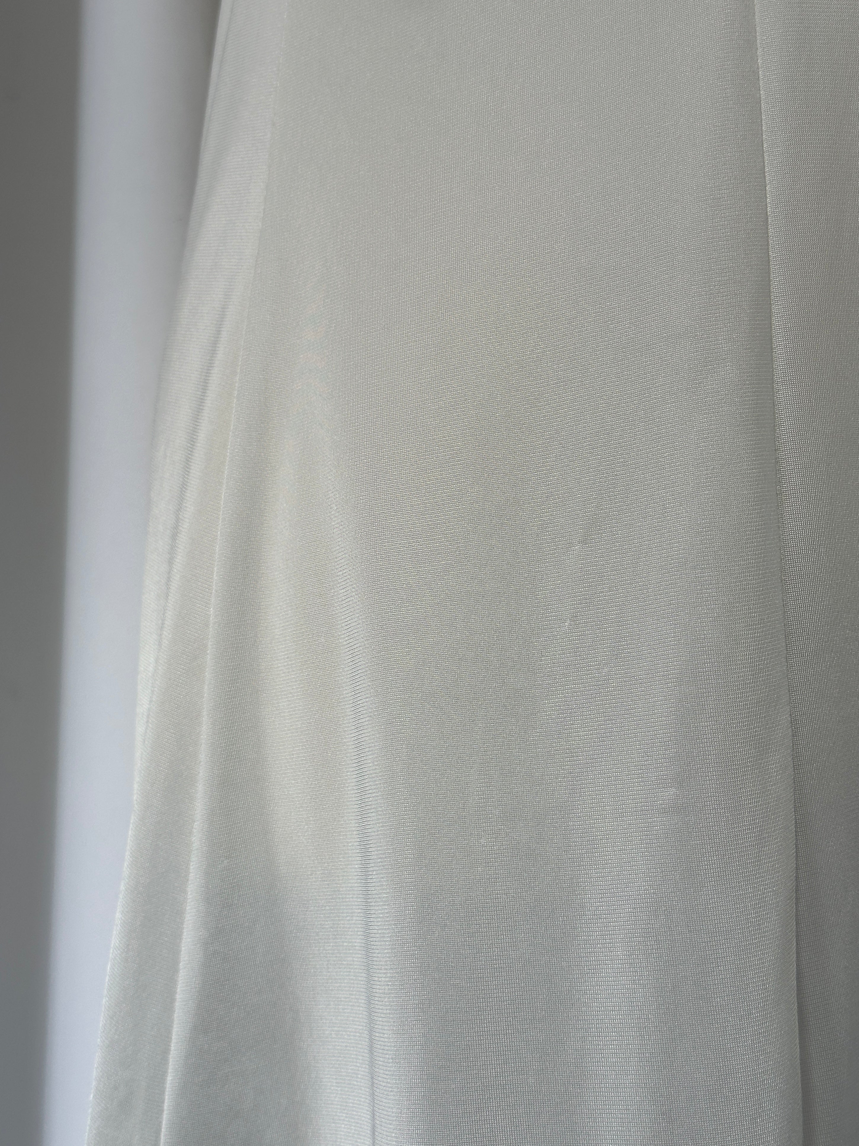 Japanese vintage 1990s lace sheer mini slip dress in size S, featuring delicate lace details and a retro-inspired design.