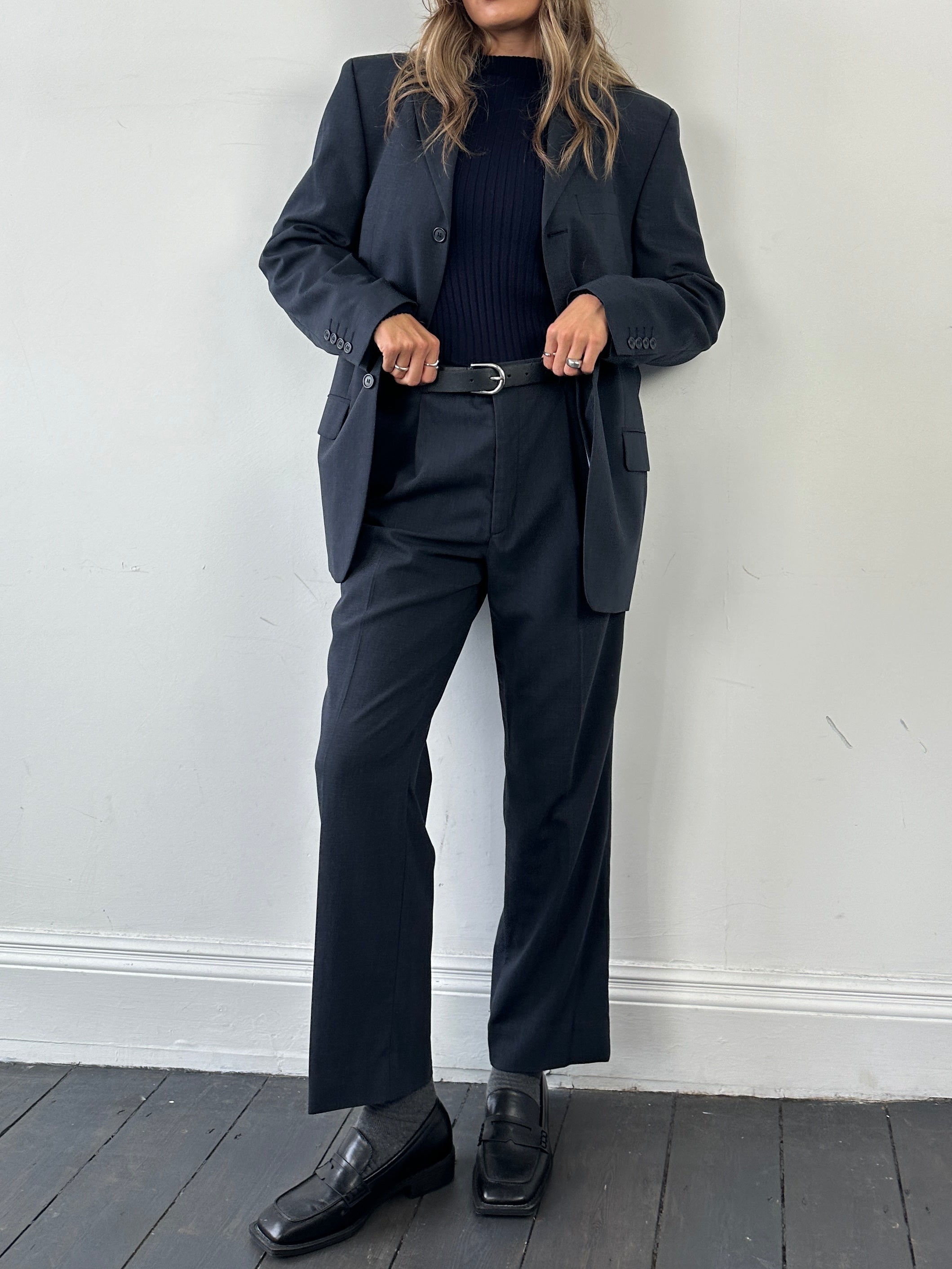 Vintage wool single-breasted jumpsuit in size 38R/W30, featuring a classic tailored fit and vintage style.