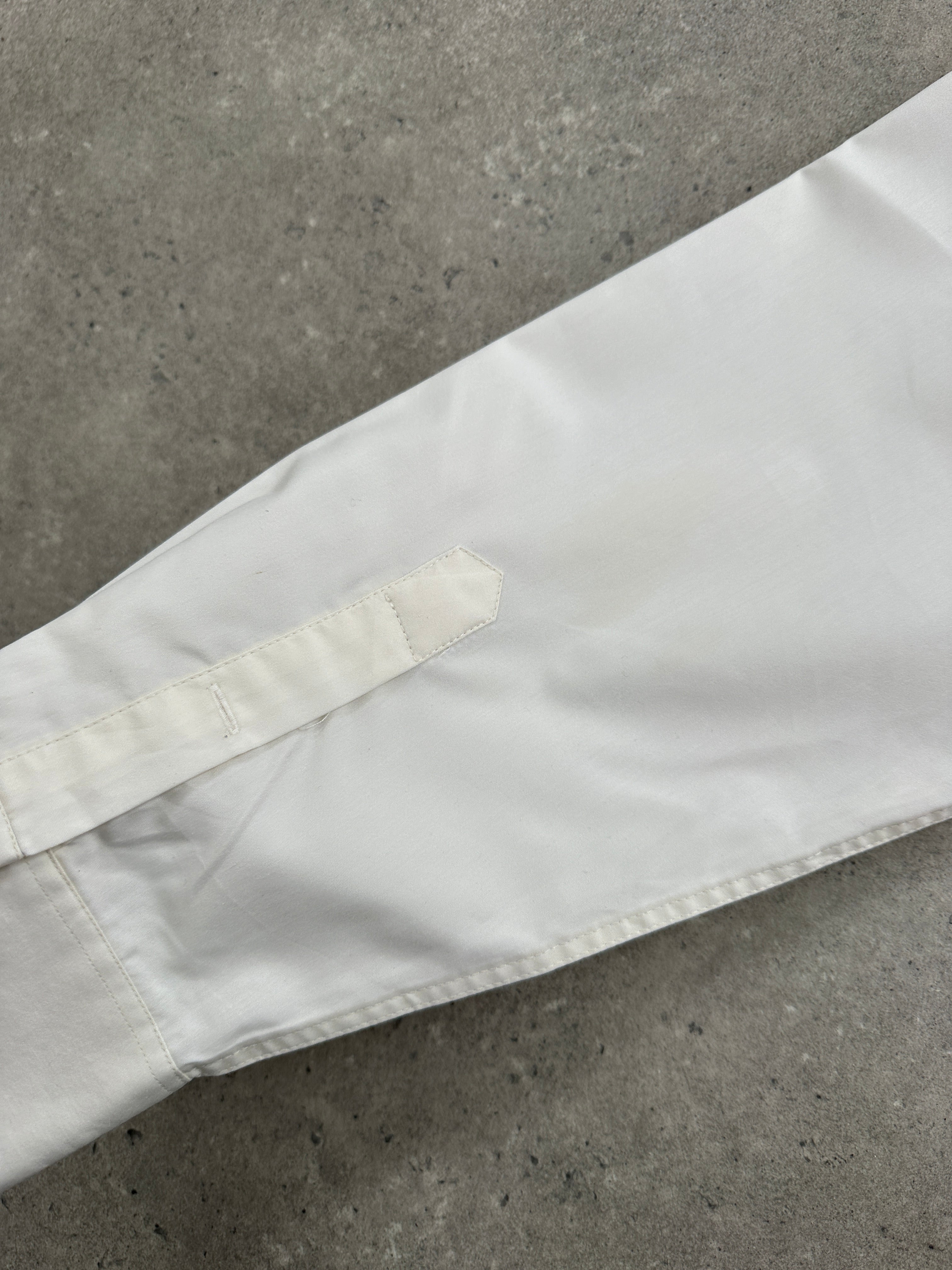 Yves Saint Laurent Pour Homme 1990s cotton logo shirt in size L, featuring a classic design with the YSL logo on the front.