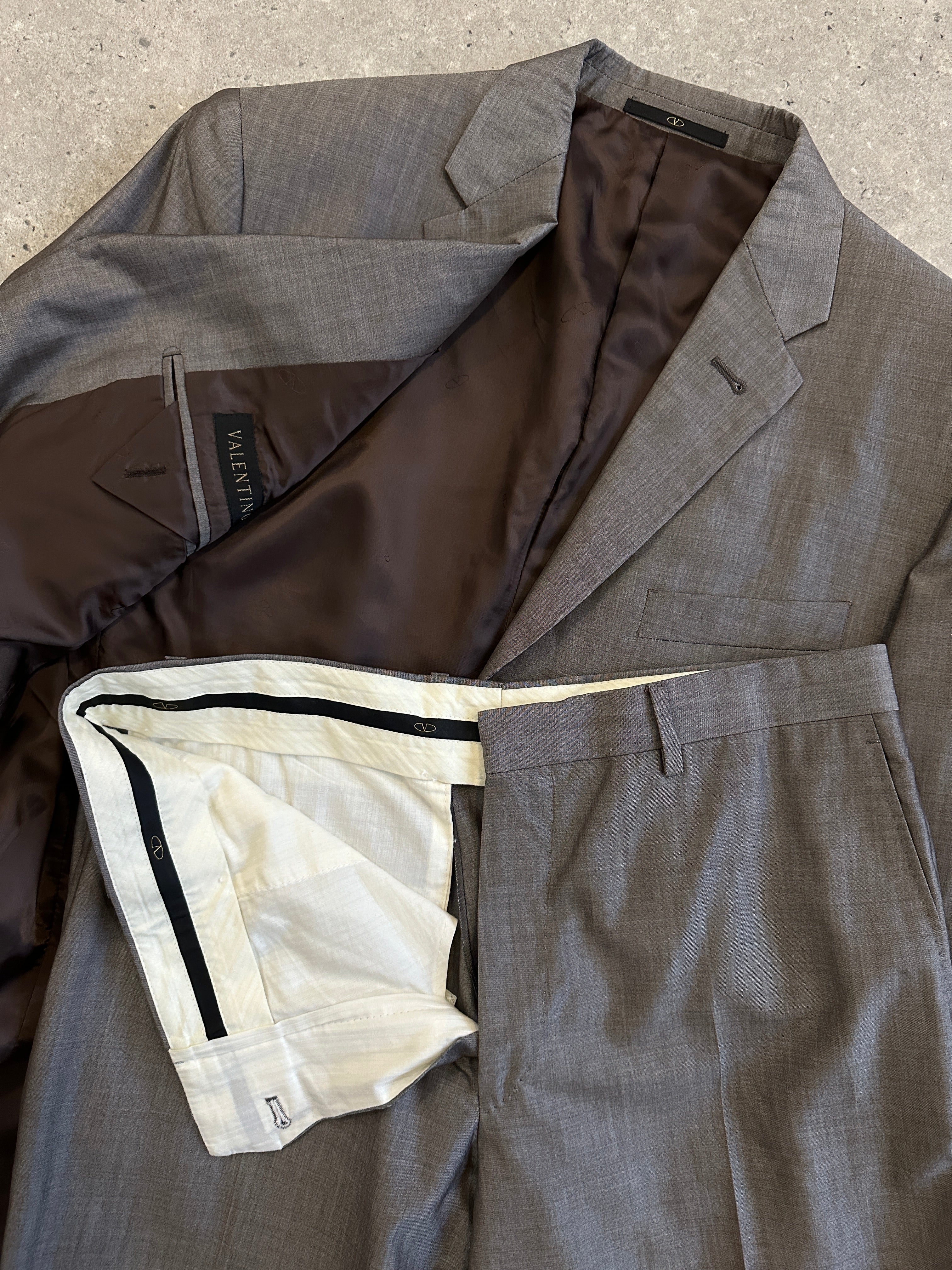 Valentino Virgin Wool Silk Single Breasted Suit jumpsuit in size 42R/W32, tailored fit with elegant lapel and sleek design.