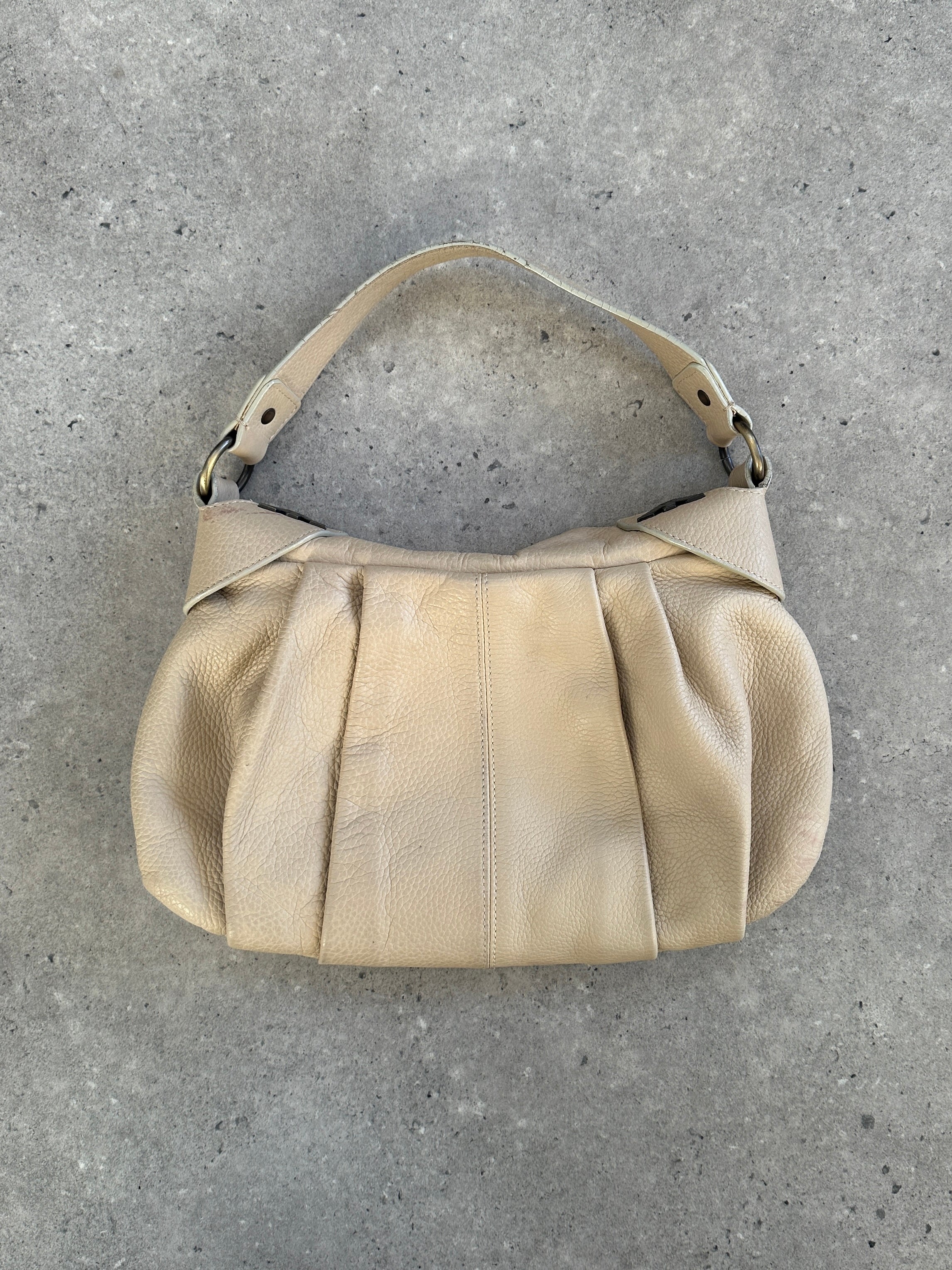 Emporio Armani 2000s leather pleated shoulder bag with a structured design and top handle, featuring a sleek, classic style.