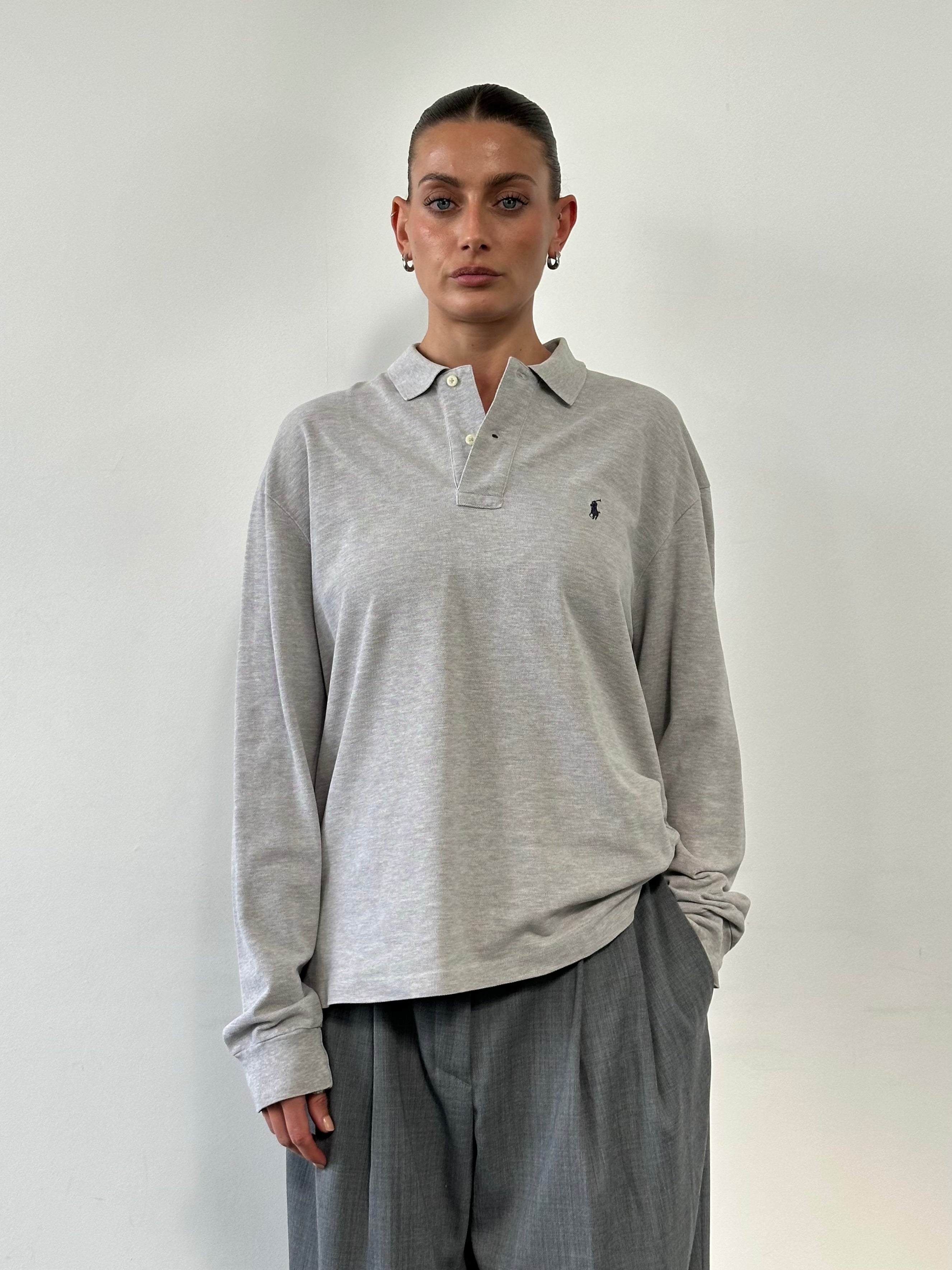 Ralph Lauren pure cotton logo polo shirt in size L, featuring a classic collar, button placket, and embroidered Ralph Lauren logo.