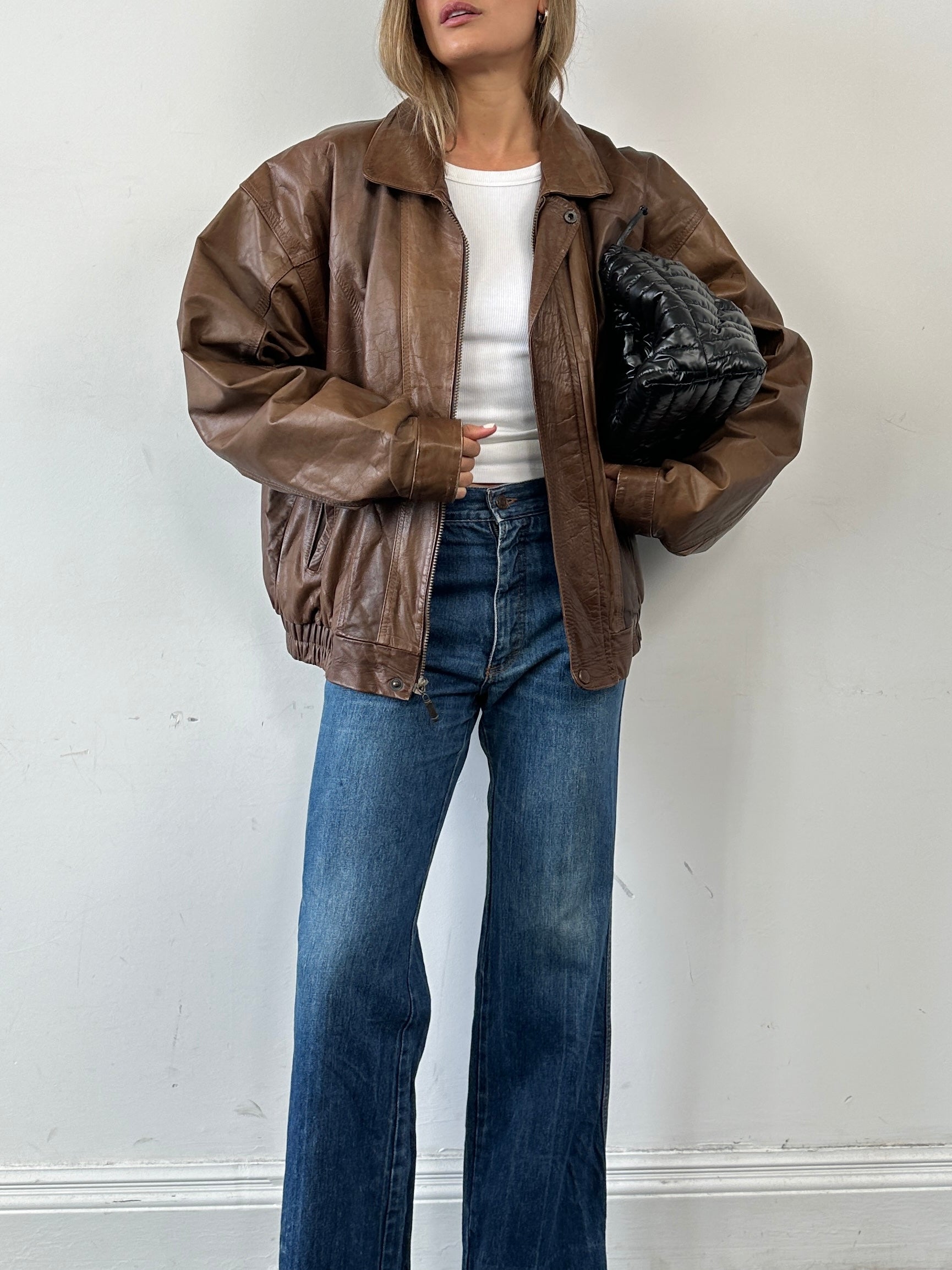 Carrera Italian straight leg denim jeans in size W30, showing classic blue denim with five-pocket design and belt loops.