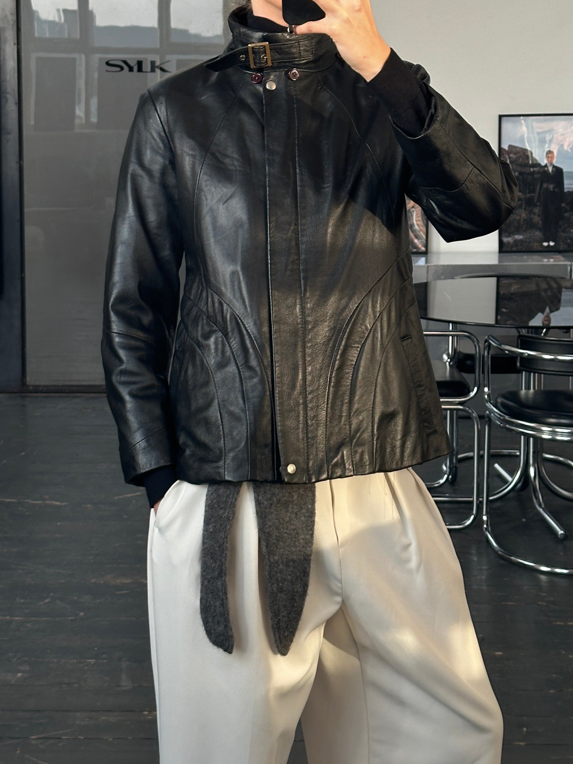 Vintage Italian 1990s high-neck leather jacket in size M, featuring classic design and rich brown leather.