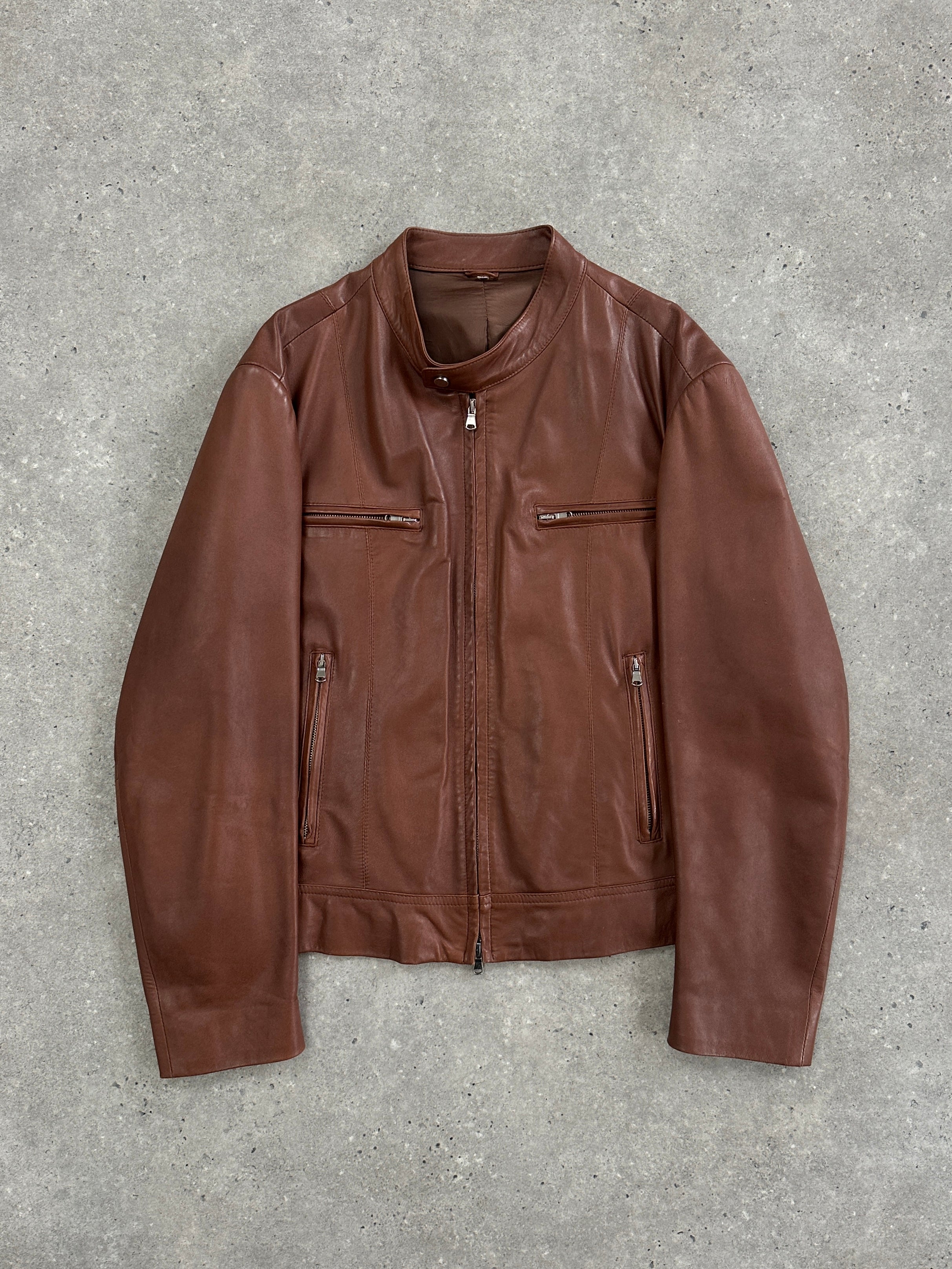 Italian vintage 90s double zip moto leather jacket by Vintage, front view showing black distressed leather and silver zippers.