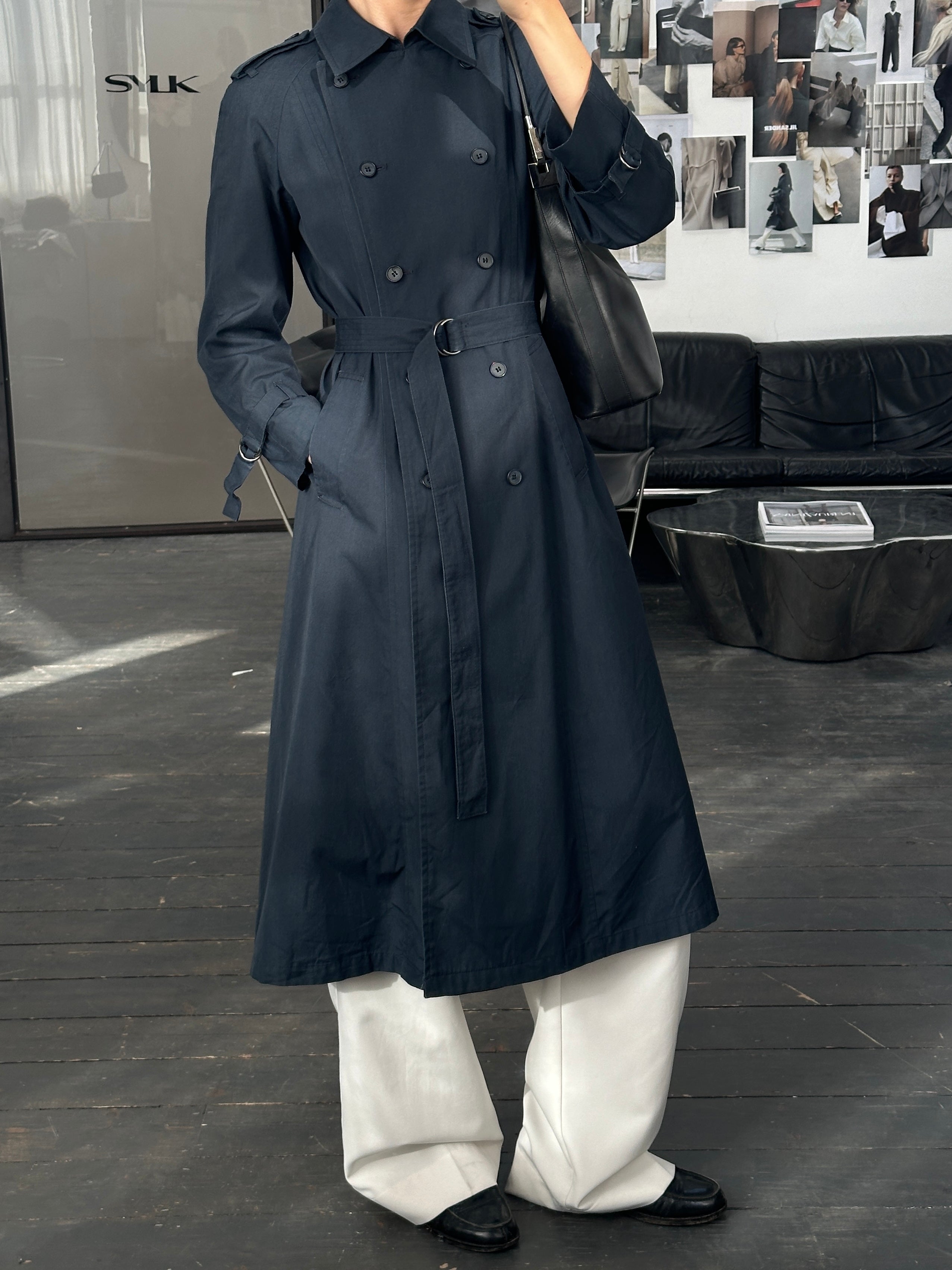 London Fog 1980s double-breasted cotton trench coat in size S, shown hanging with classic collar and belt detail.