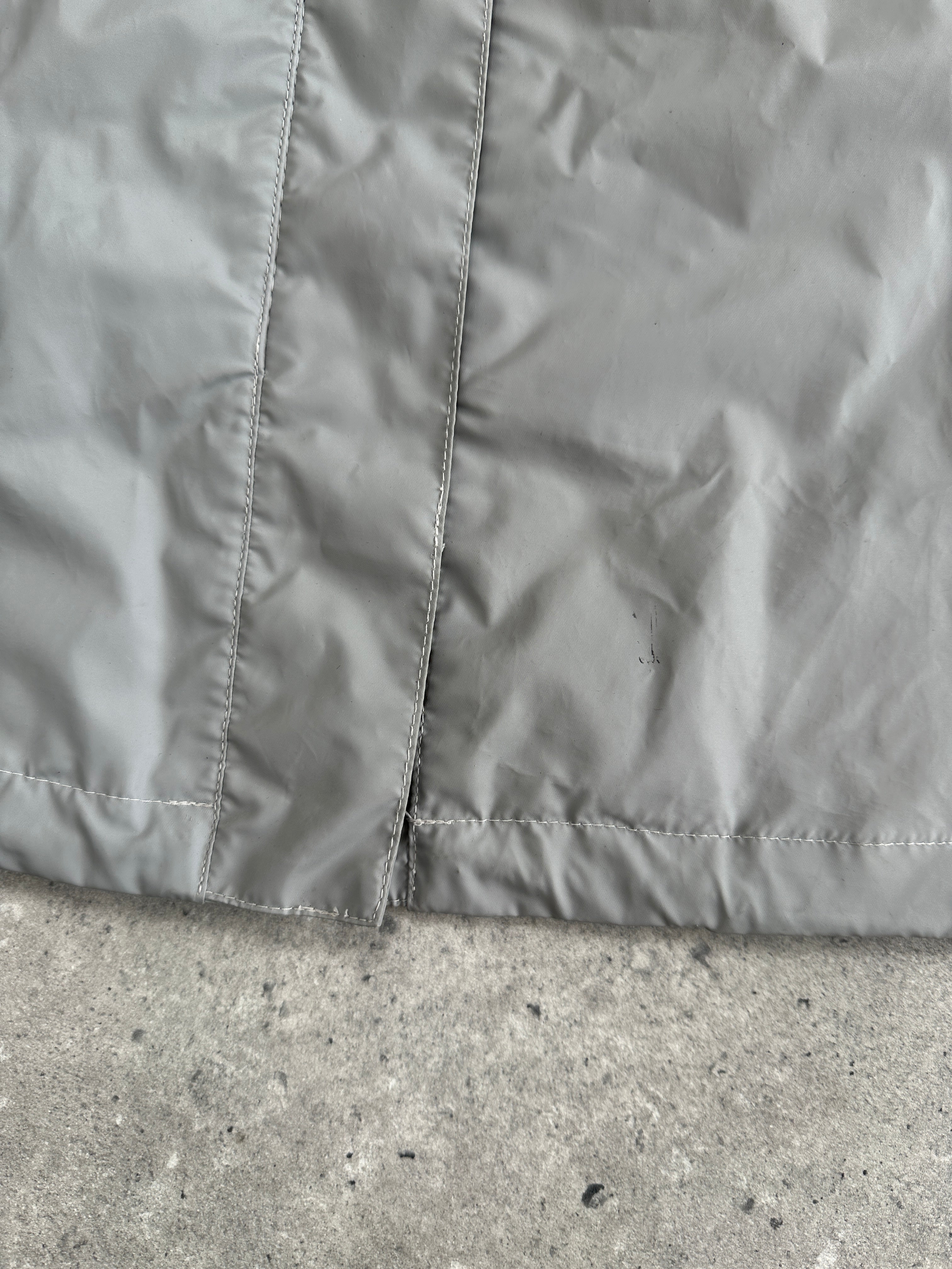 Valentino Sport raincoat jacket in size L, stylish waterproof outerwear with a sleek design and Valentino branding.