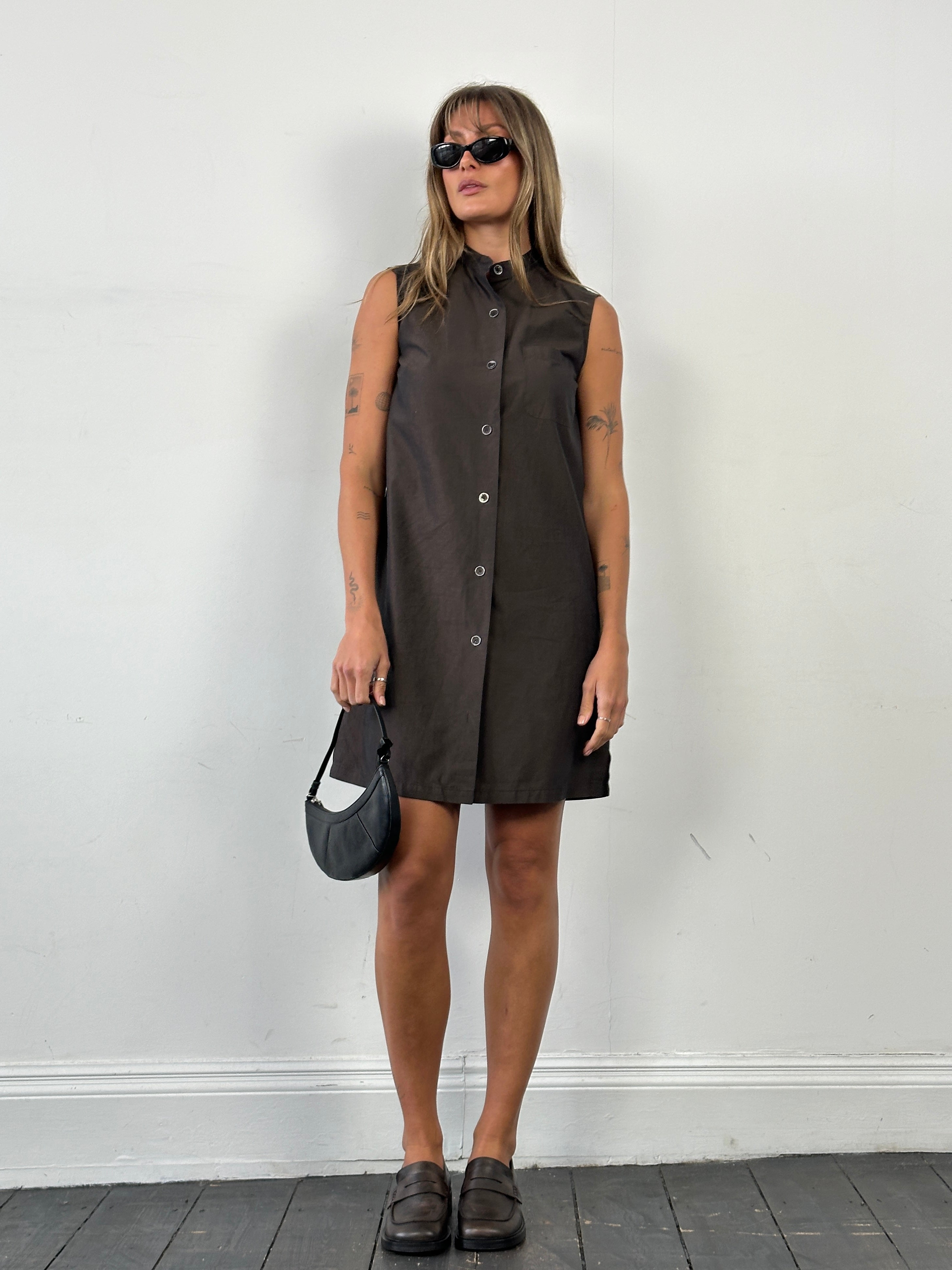 Max Mara sleeveless pure cotton A-line shirt dress in white, showcasing a fitted bodice and flared skirt design.