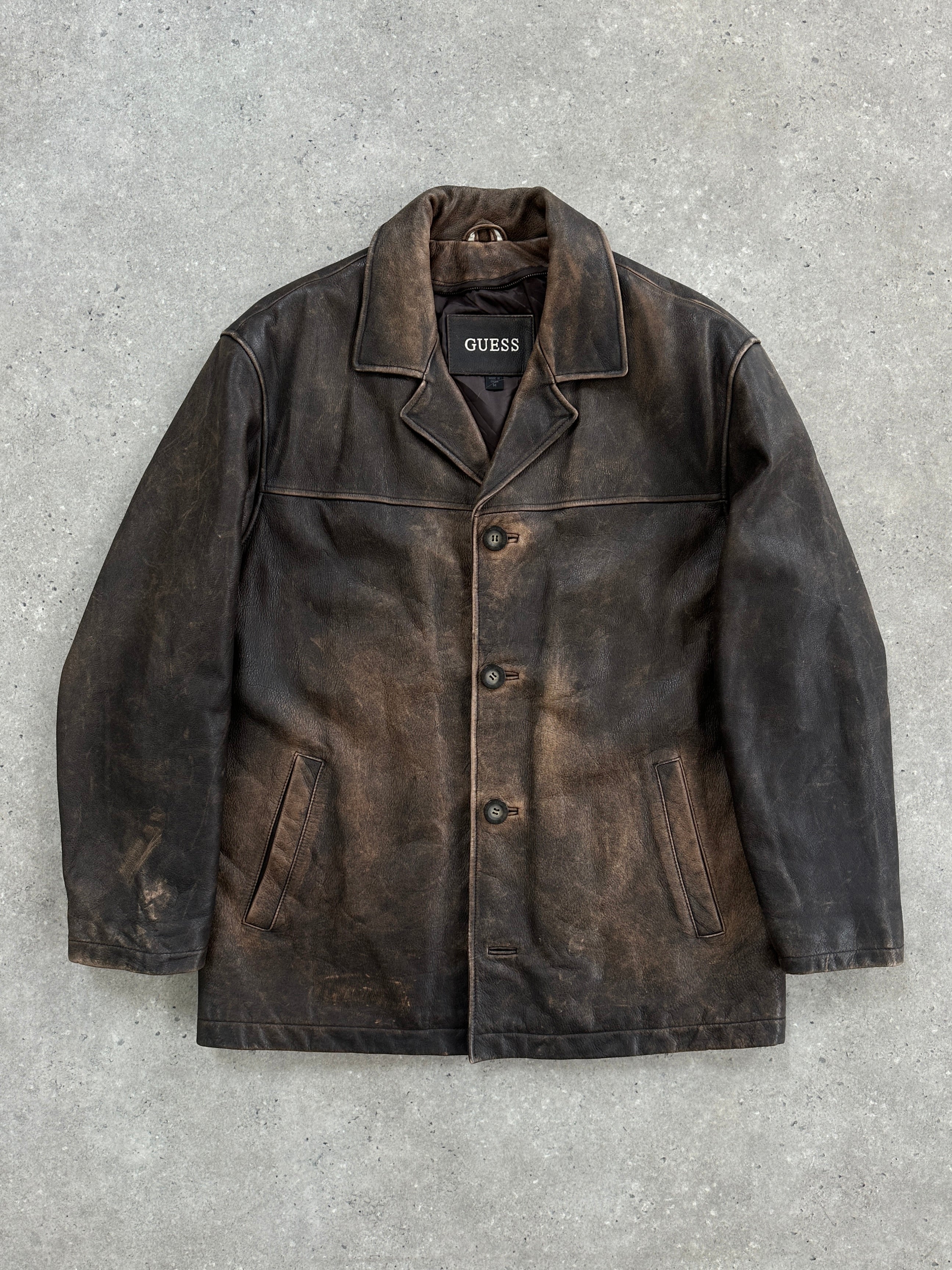 Guess distressed leather jacket in size XL, featuring a rugged design with worn leather finish and classic collar details.