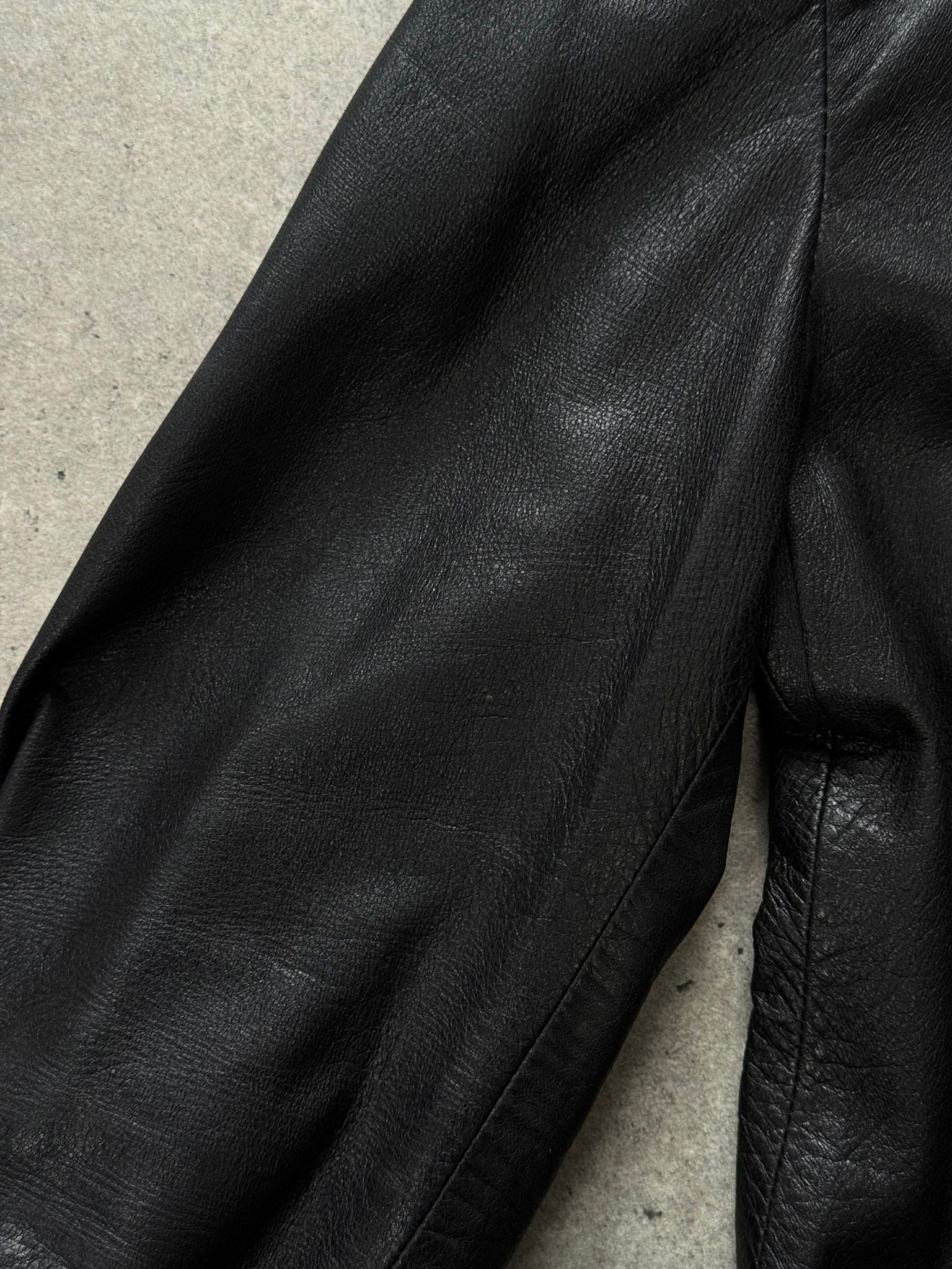 Versace 1990s fitted leather jacket in XS, black leather with classic design and silver hardware, shown on a mannequin.