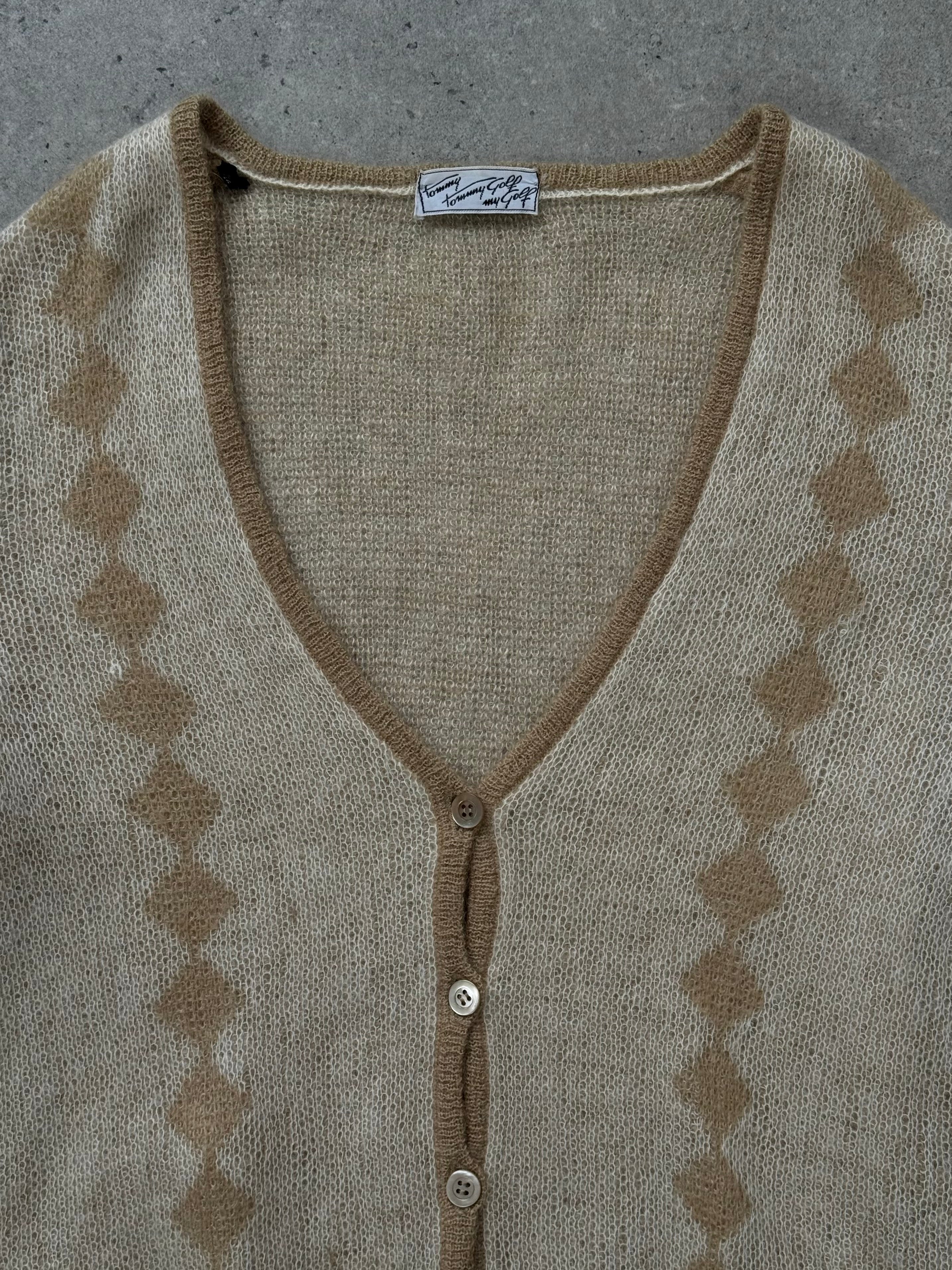 Vintage Italian 1980s mohair cardigan in S/M, featuring a cozy, textured knit with a classic fit and retro style.