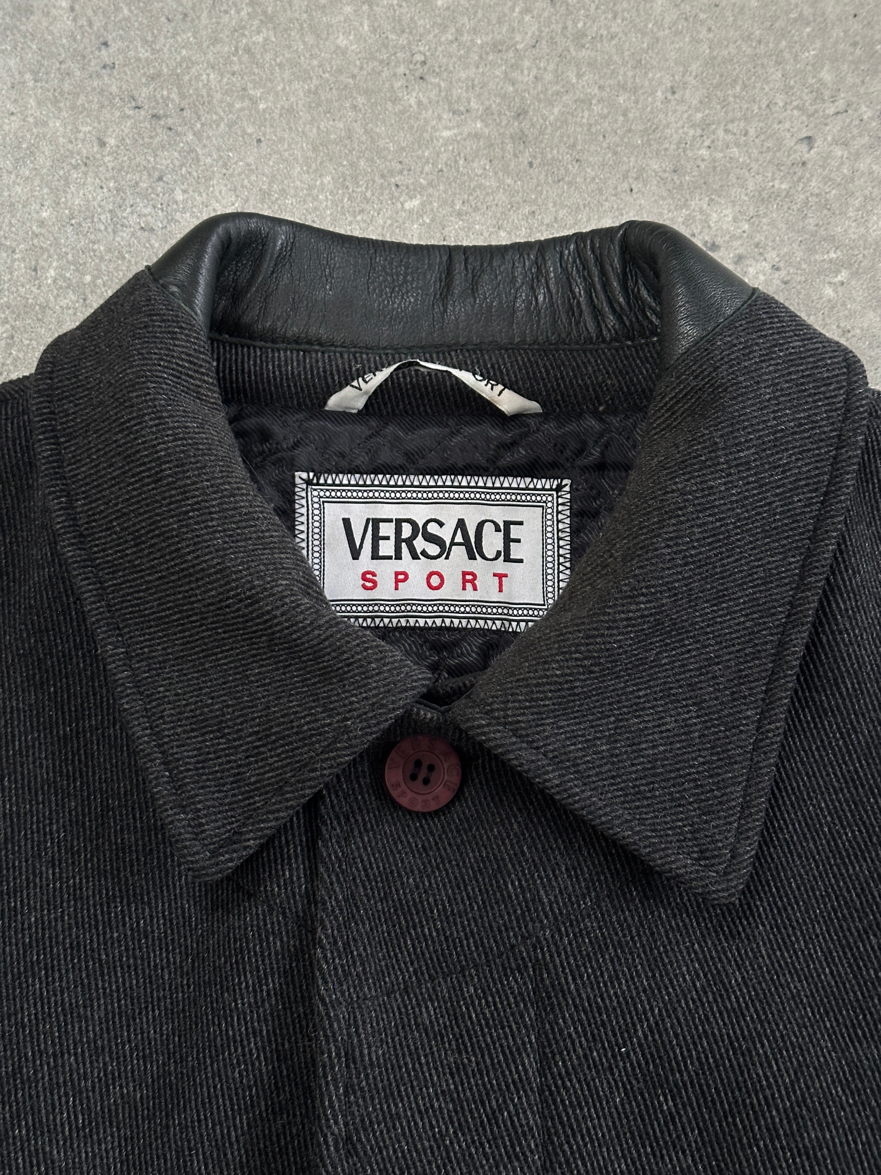 Versace Sport 1990s wool twill coat with concealed placket in XXL/XXXL size, featuring a classic design and tailored fit.