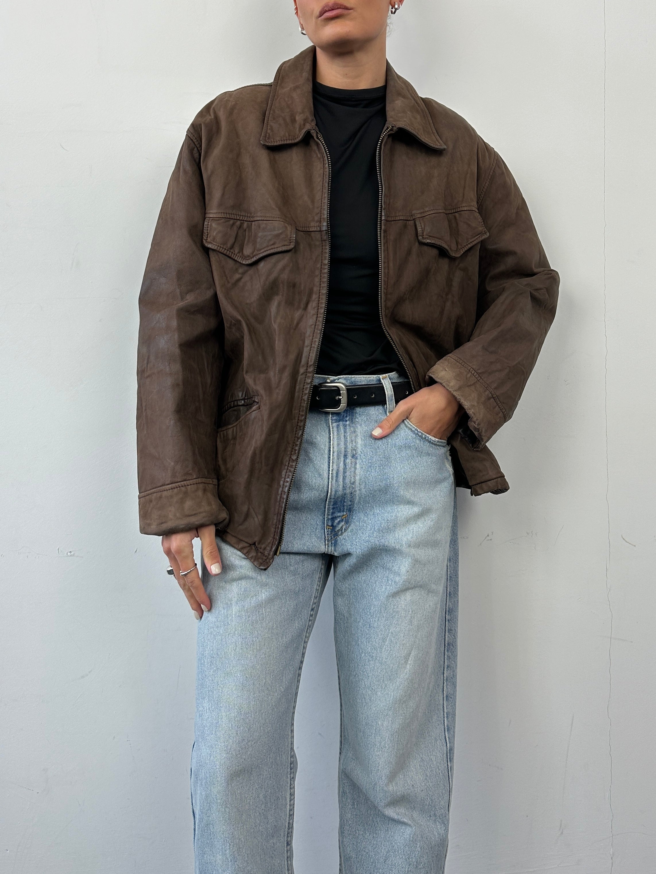 Vintage Italian vintage nubuck leather zip-up jacket in size L, featuring classic style and soft textured leather.