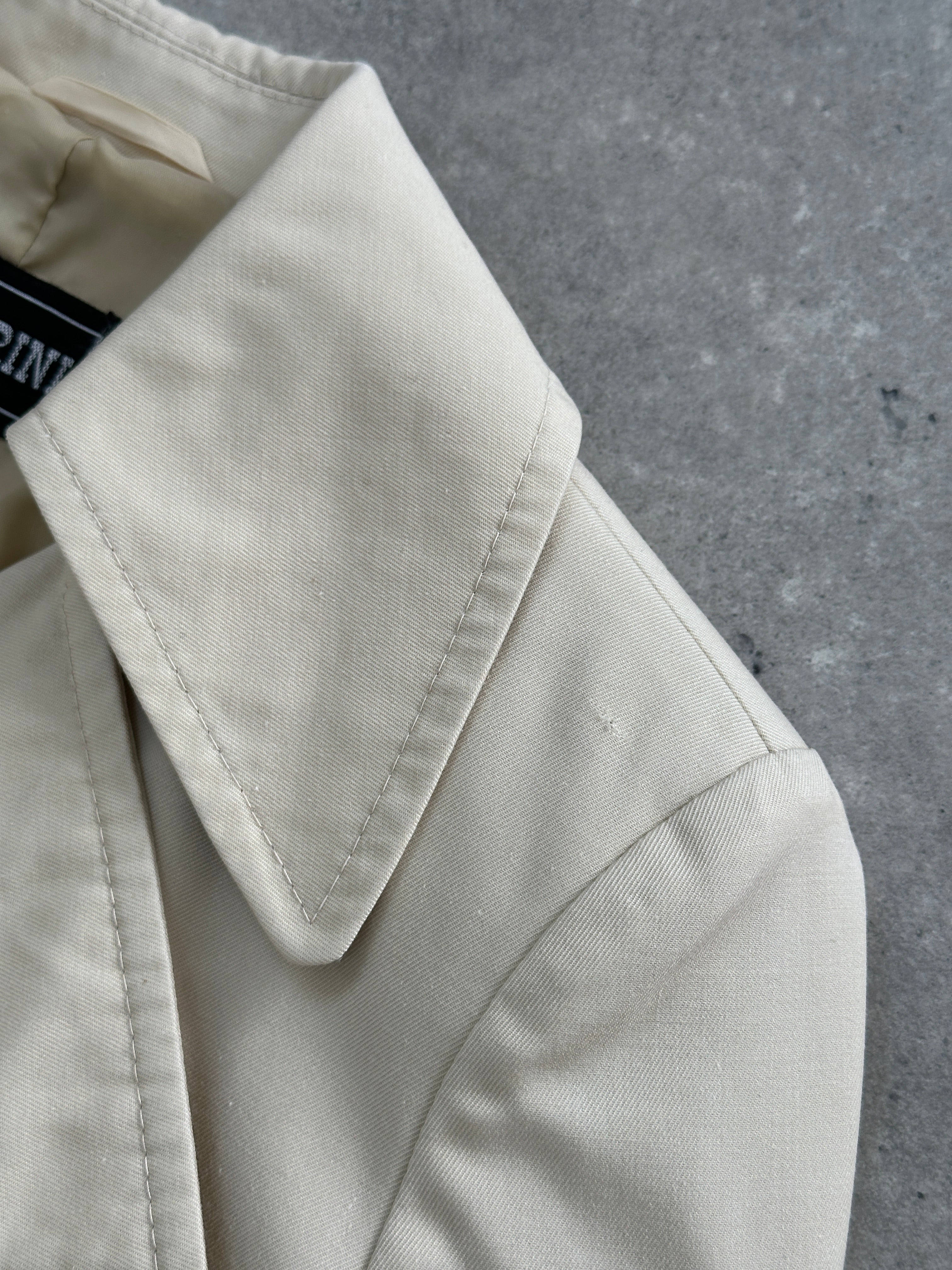 Vintage 1980s cotton double-breasted belted trench coat, XS size, classic beige color, stylish and timeless outerwear.