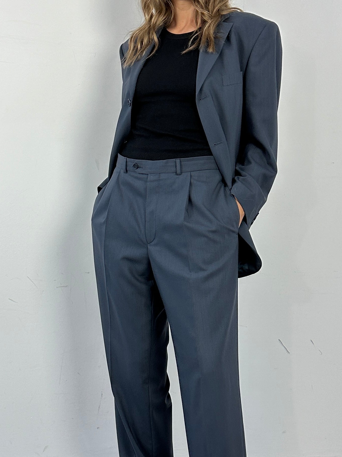 Balmain pure wool single-breasted jumpsuit in size 38S/W32, featuring tailored fit and classic lapel design.
