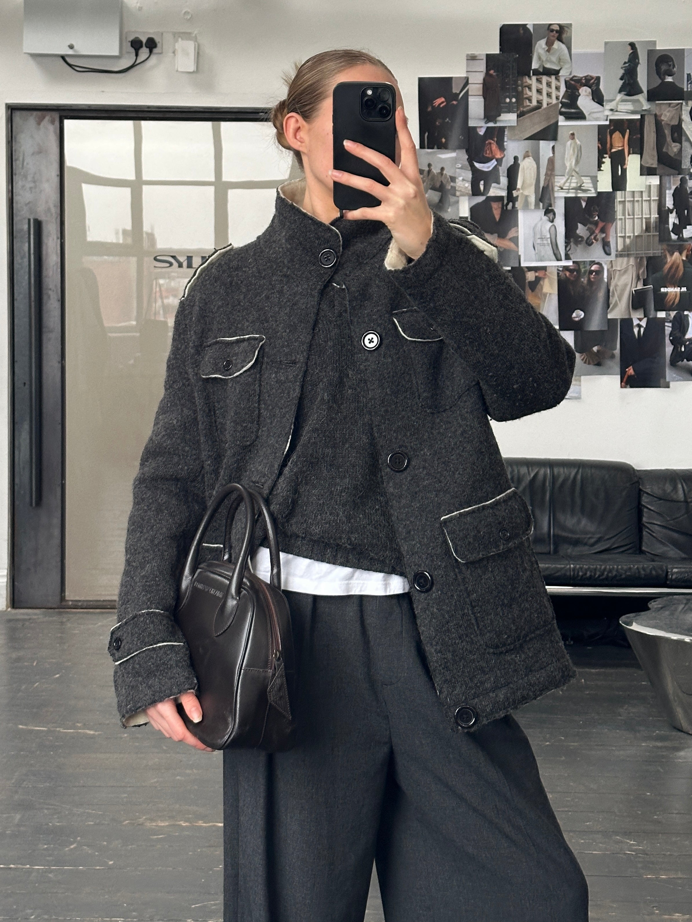 Vintage 1990s wool high neck utility jacket in size large, showcasing classic design and durable fabric.
