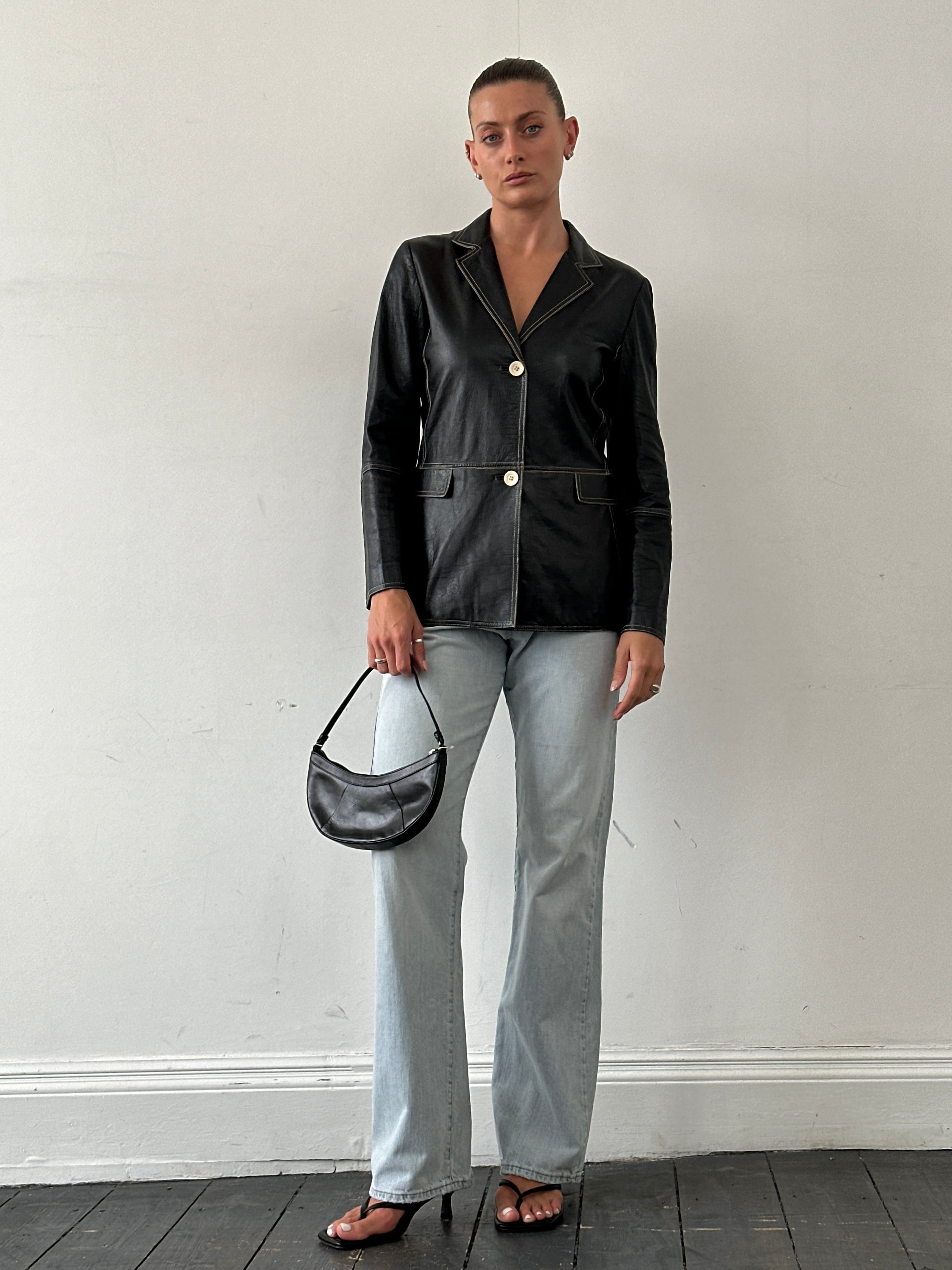 Marella contrast stitch leather jacket in size S, featuring stylish detailing and a sleek fit.