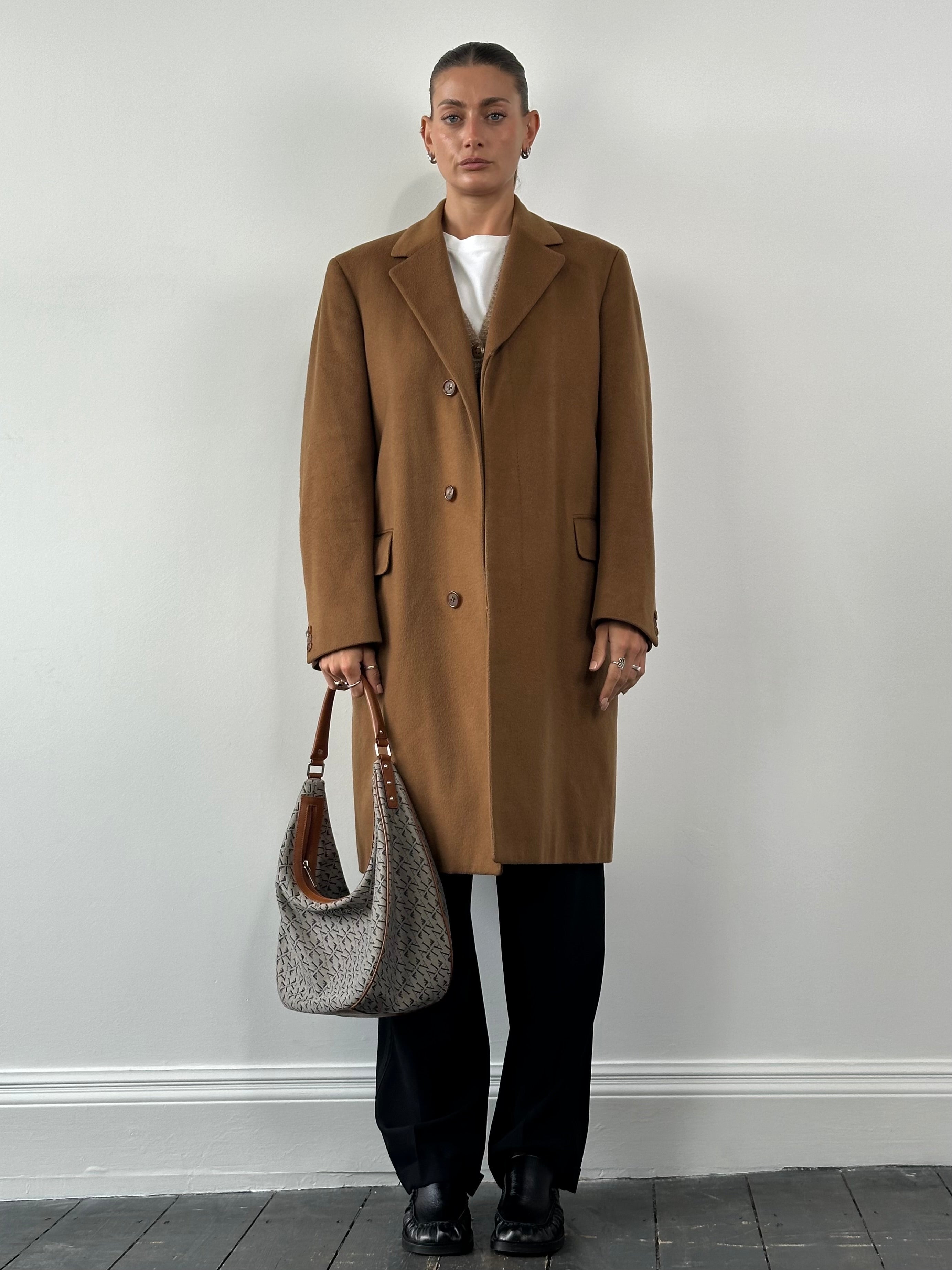 Vintage pure cashmere coat with concealed placket, size L/XL, showcasing soft, luxurious fabric and classic tailored design.
