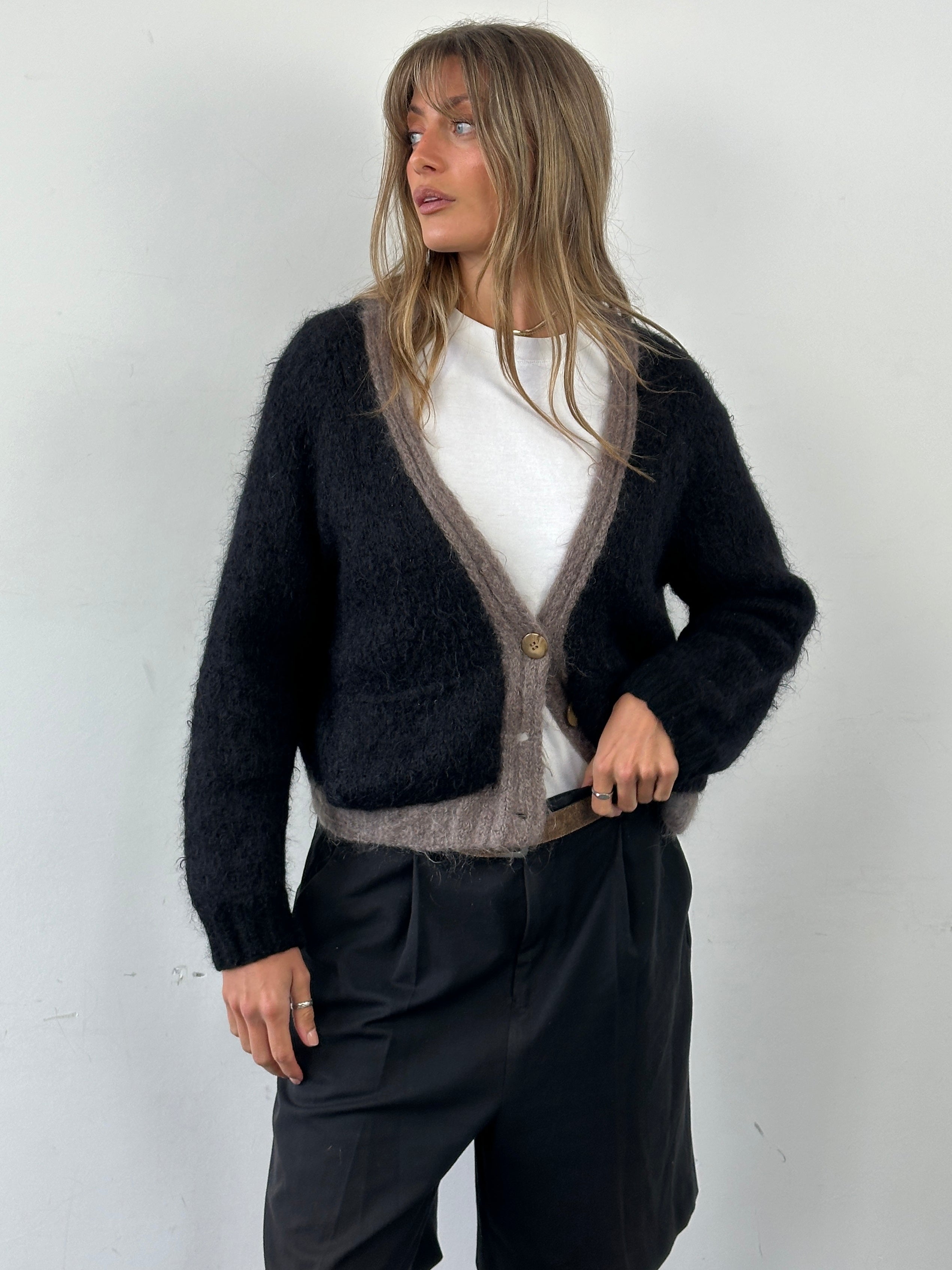 Vintage mohair wool fuzzy cardigan in size L, featuring soft texture and cozy design, perfect for casual or layered outfits.
