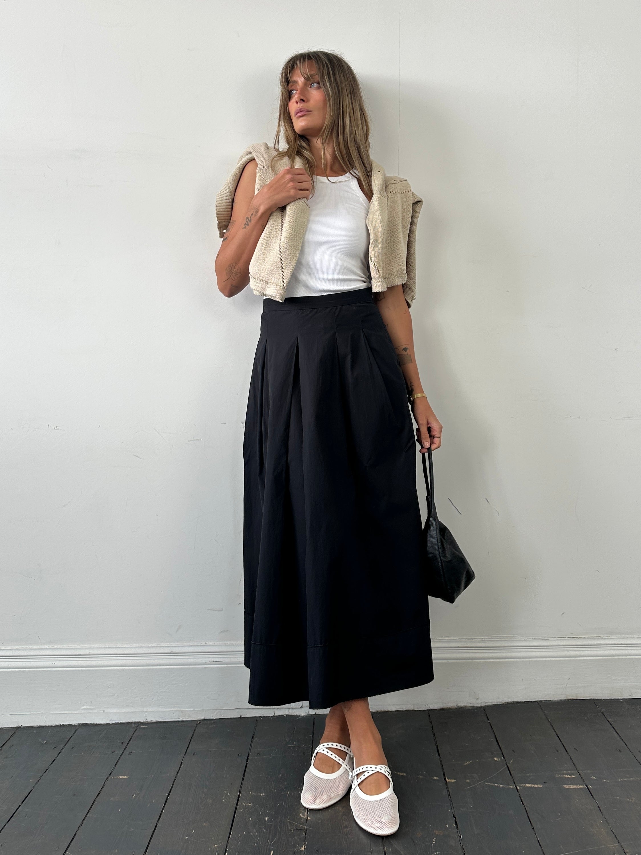 Max Mara Studio pure cotton pleated maxi skirt in white, featuring a high waist and flowing design.