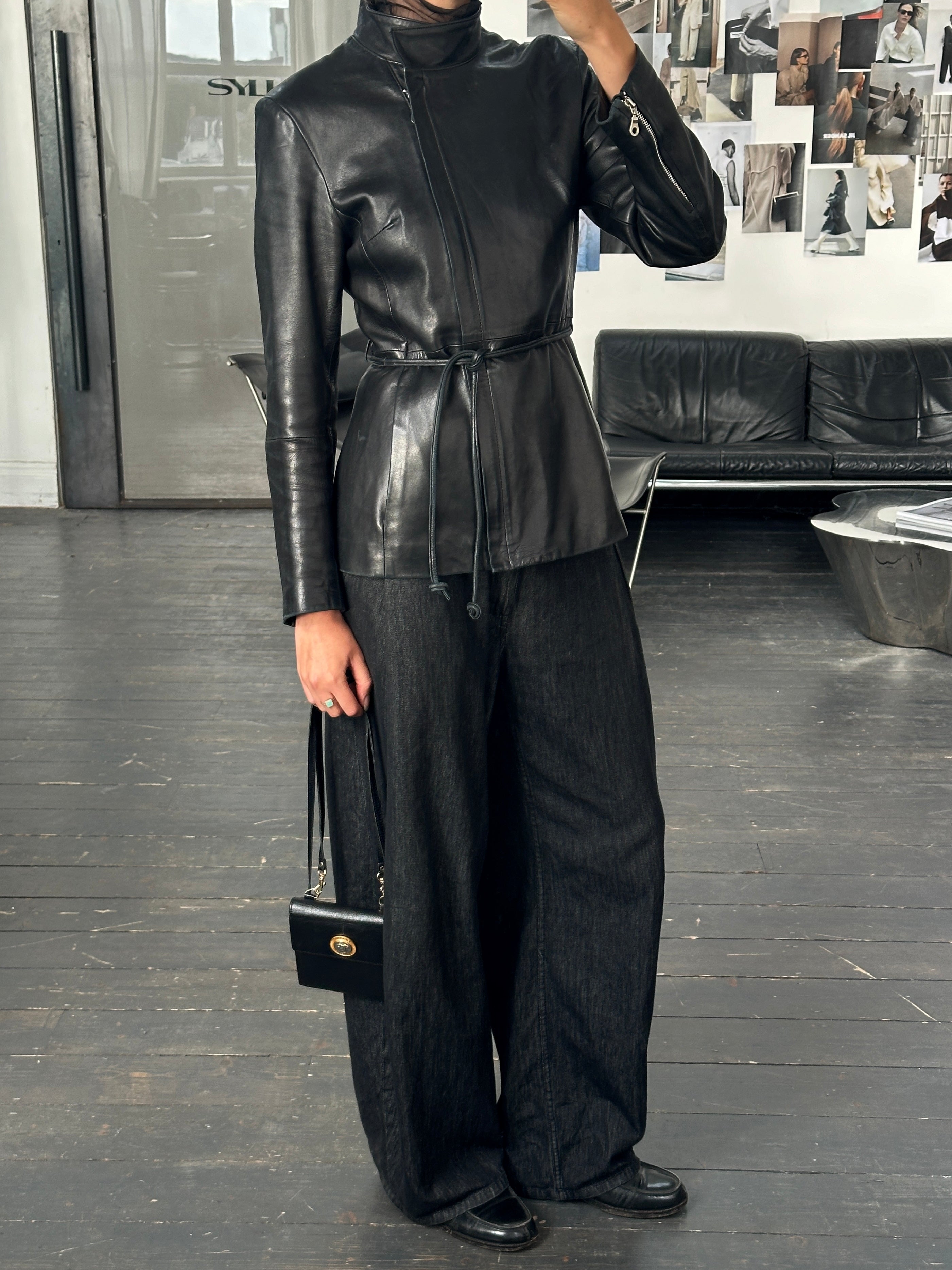 Vintage French 1990s high neck leather jacket with tie belt, in size S/M, featuring a classic retro design and high-quality leather.