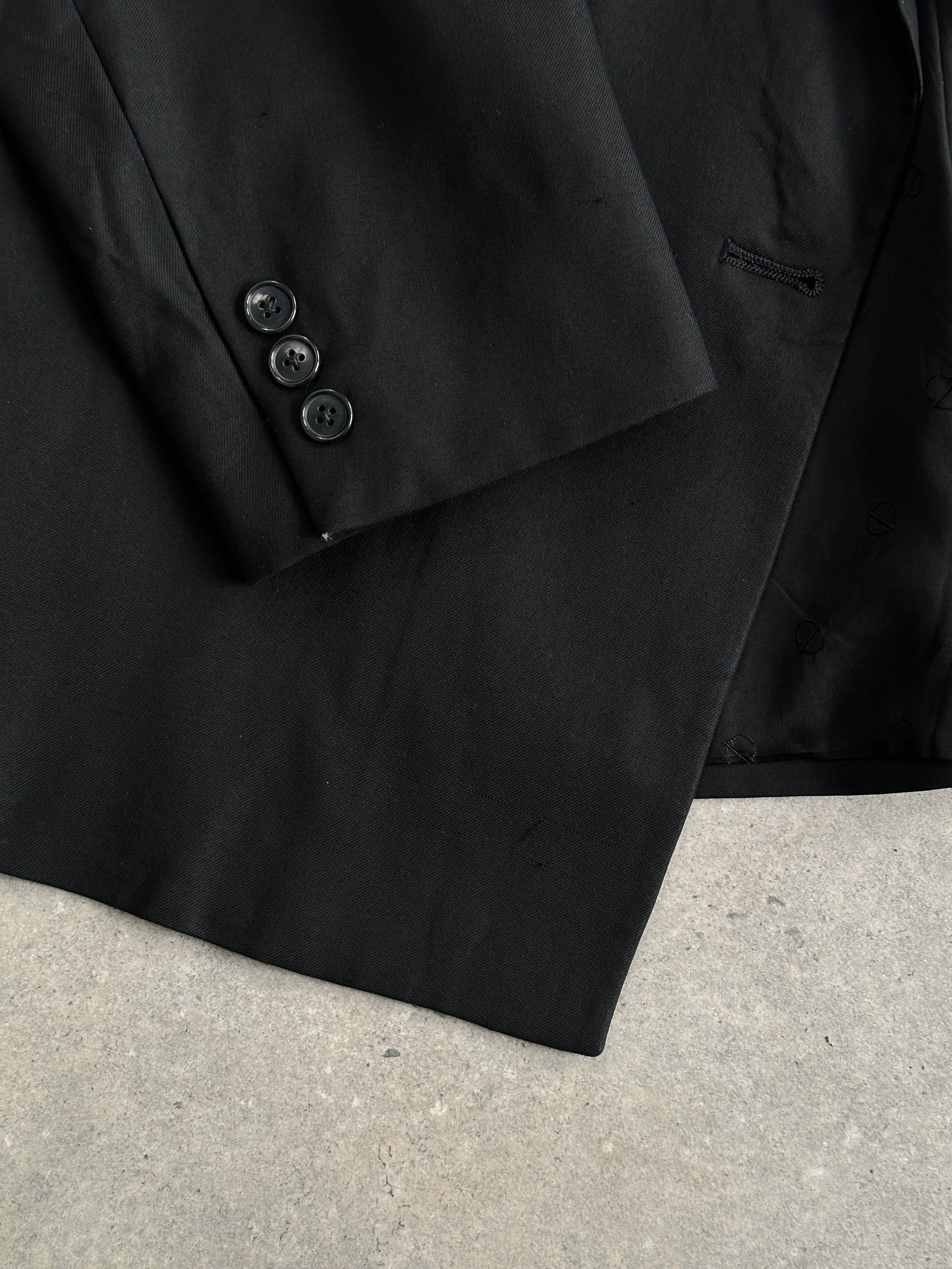 Christian Dior pure wool double-breasted blazer in size L/XL, tailored fit with classic lapels and button closures.