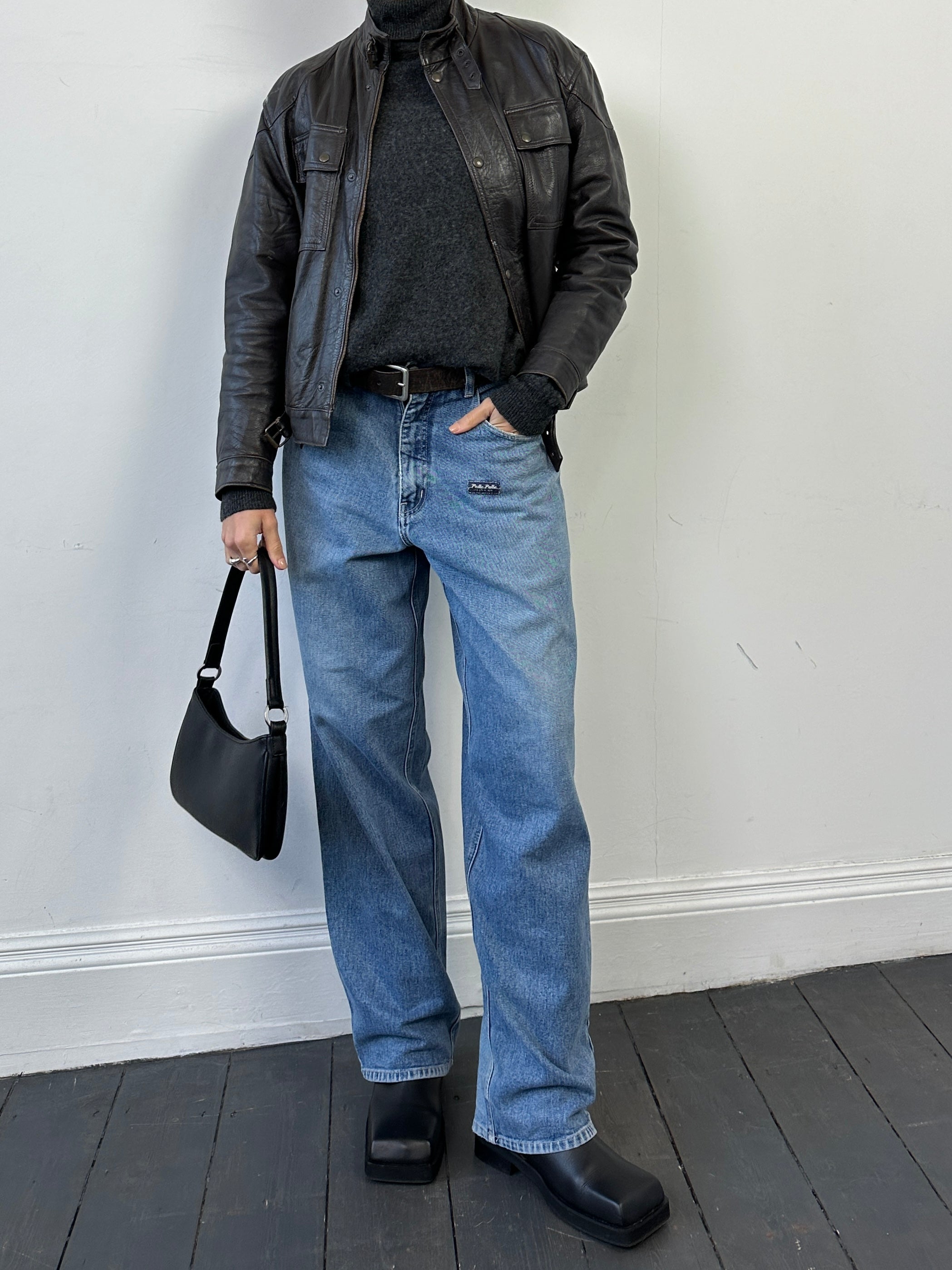 Vintage Italian vintage moto leather jacket, size small, featuring classic distressed leather and authentic vintage design details.